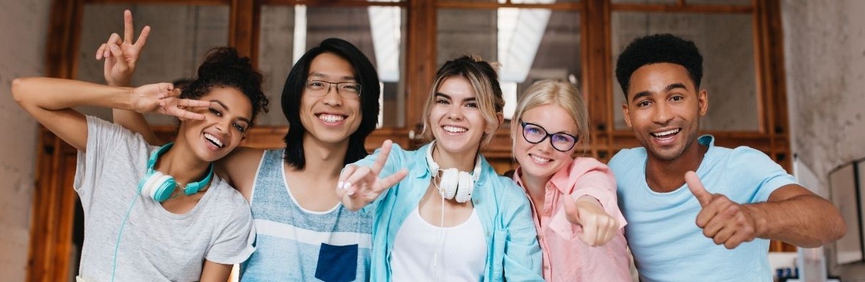 A group of international students with happy faces and smiles