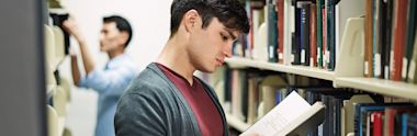 Two male students at the library