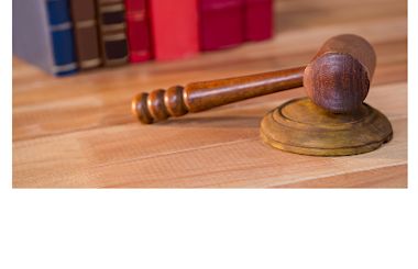 Image of a judge's hammer made out of wood