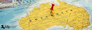 A map of Australia with a red pushpin marking a location in the Northern Territory; the idp International Education Specialists logo appears in the lower left corner.