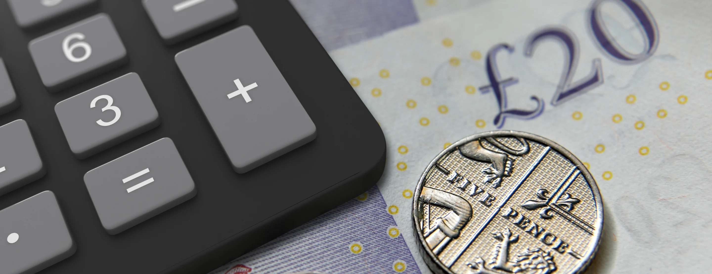 A calculator, a £20 note and a 5p piece