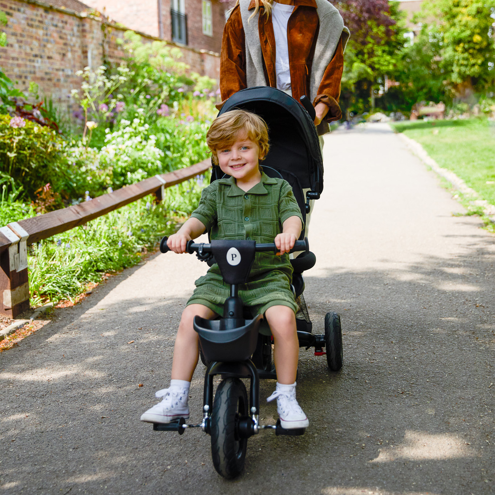 Puggle Designer Twin Spin 7-in-1 Trike – Black | The Nursery Store
