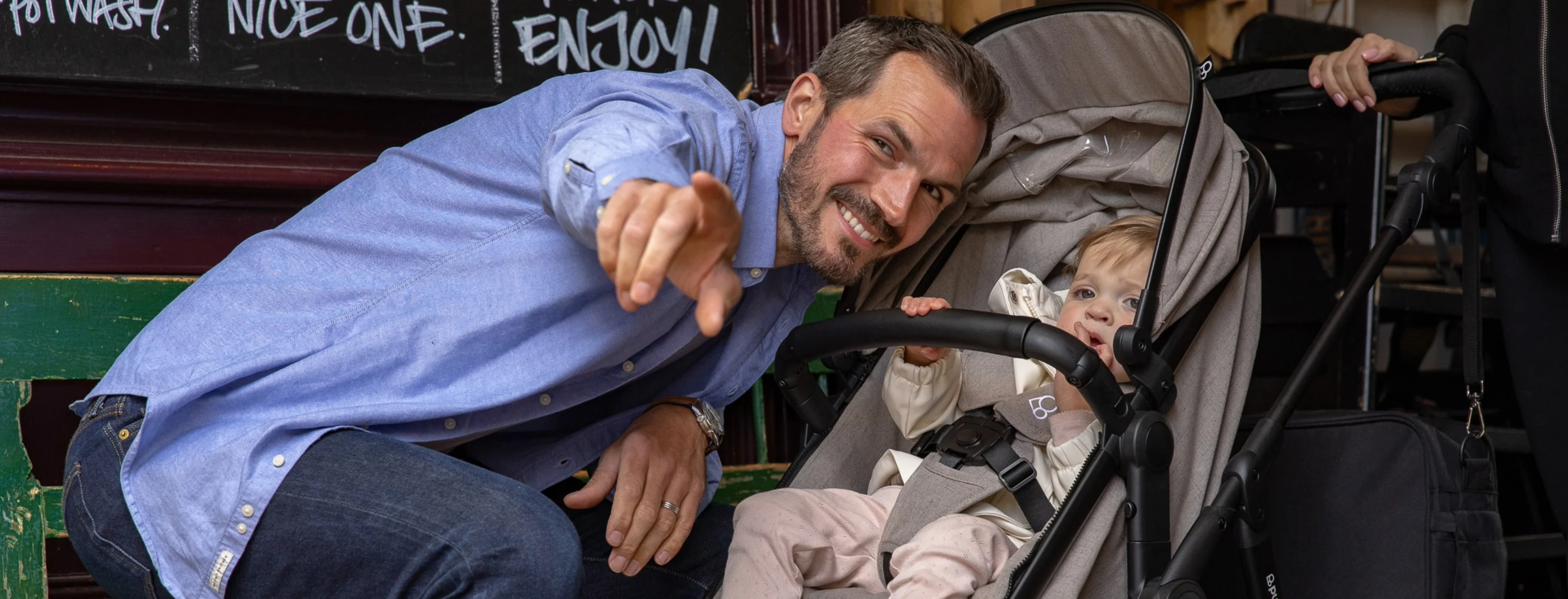 dad with baby in pushchair