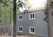 CONIFER MOUNTAIN HOME back close up