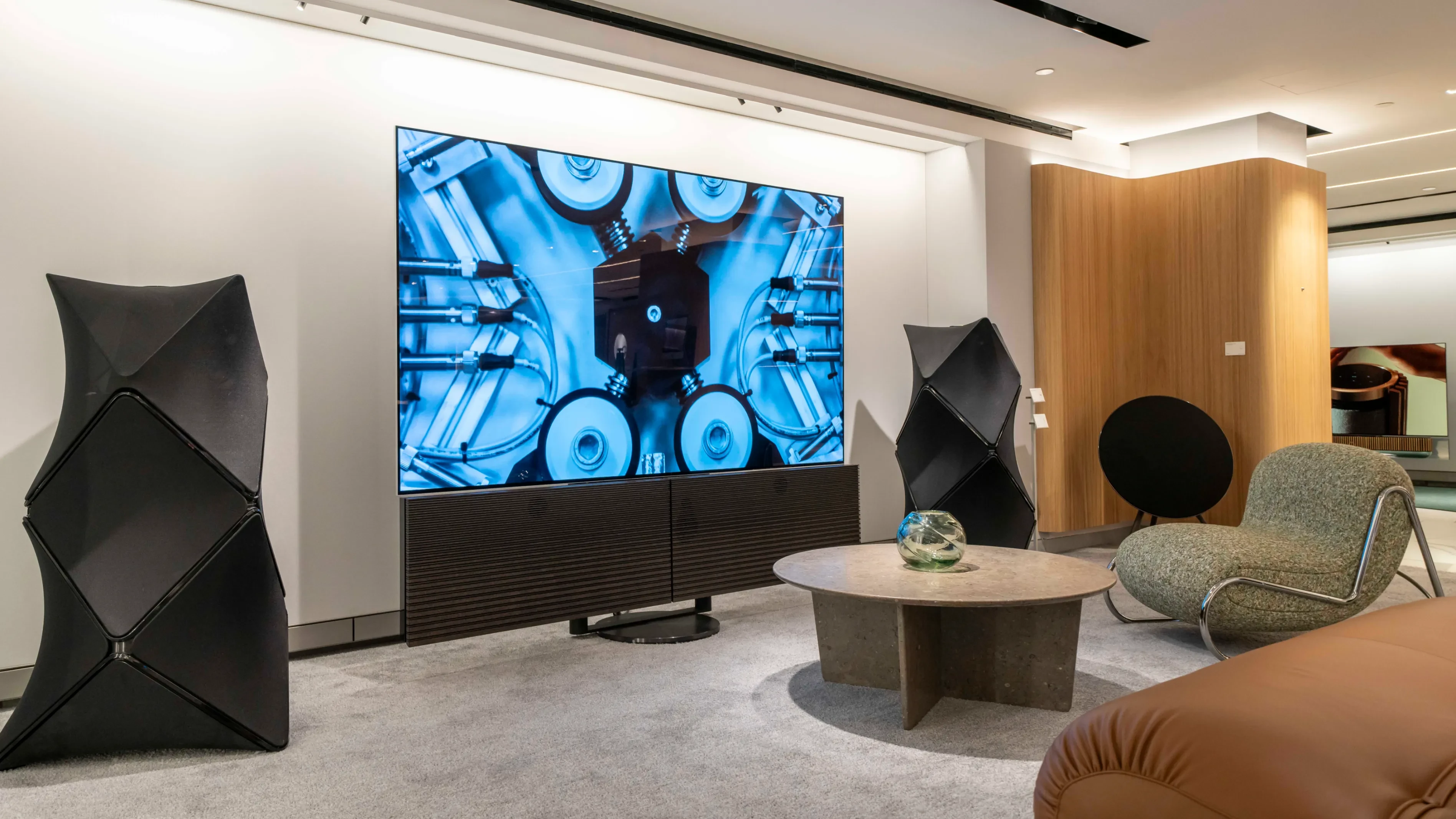 Listening space in Bang & Olufsen Harrods store in London. Beovision Harmony is placed with a set of Beolab 90 on each side.