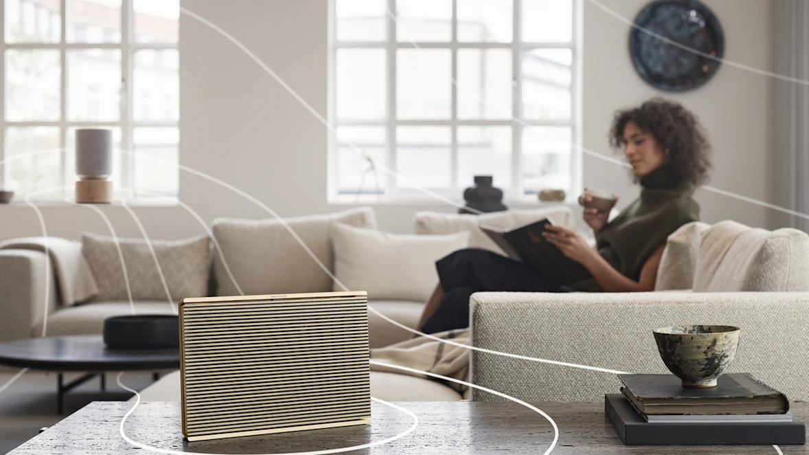 Beosound Level and Beosound Balance connected speakers playing in the living room