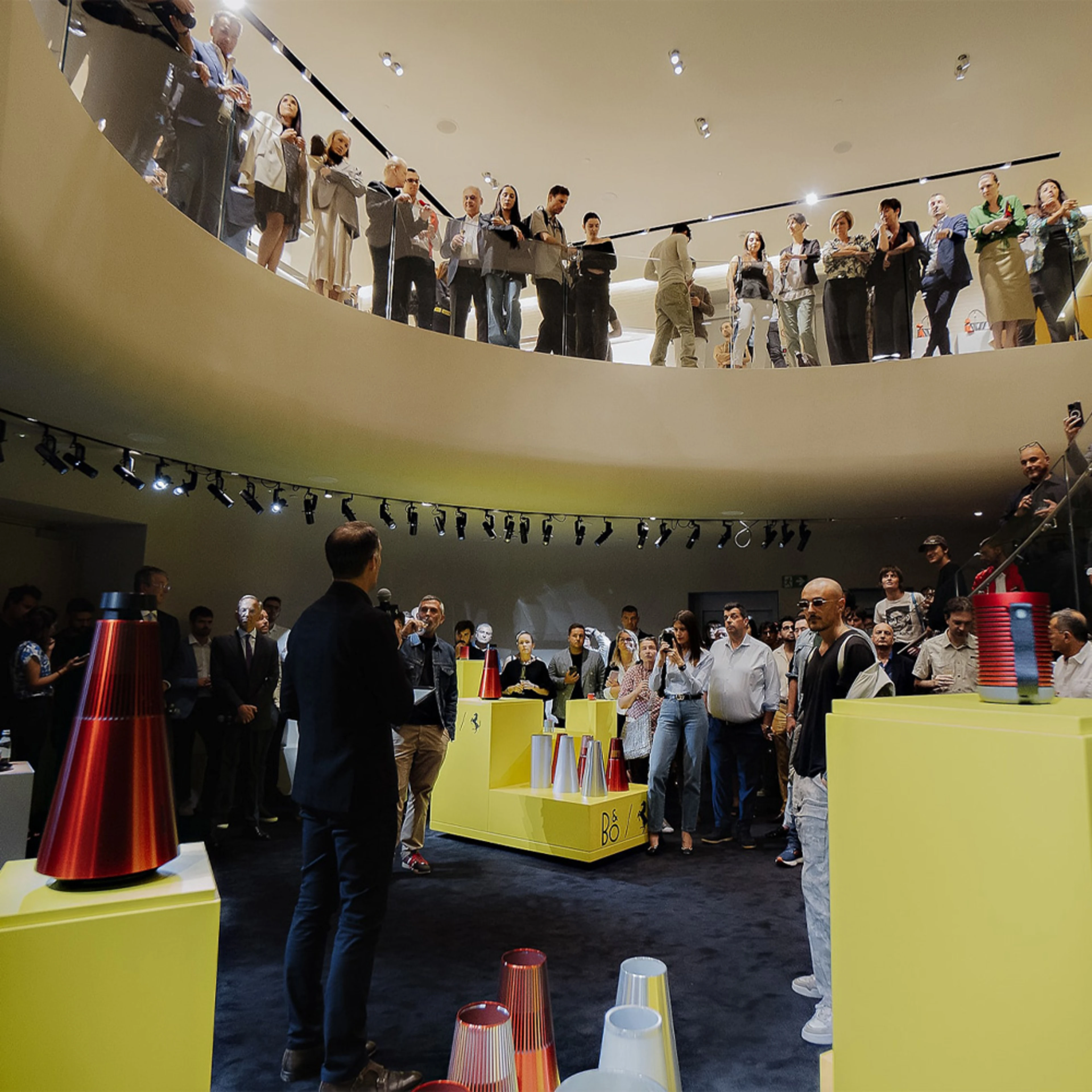 Image of people in Milan Ferrari flagship store during the Ferrari event