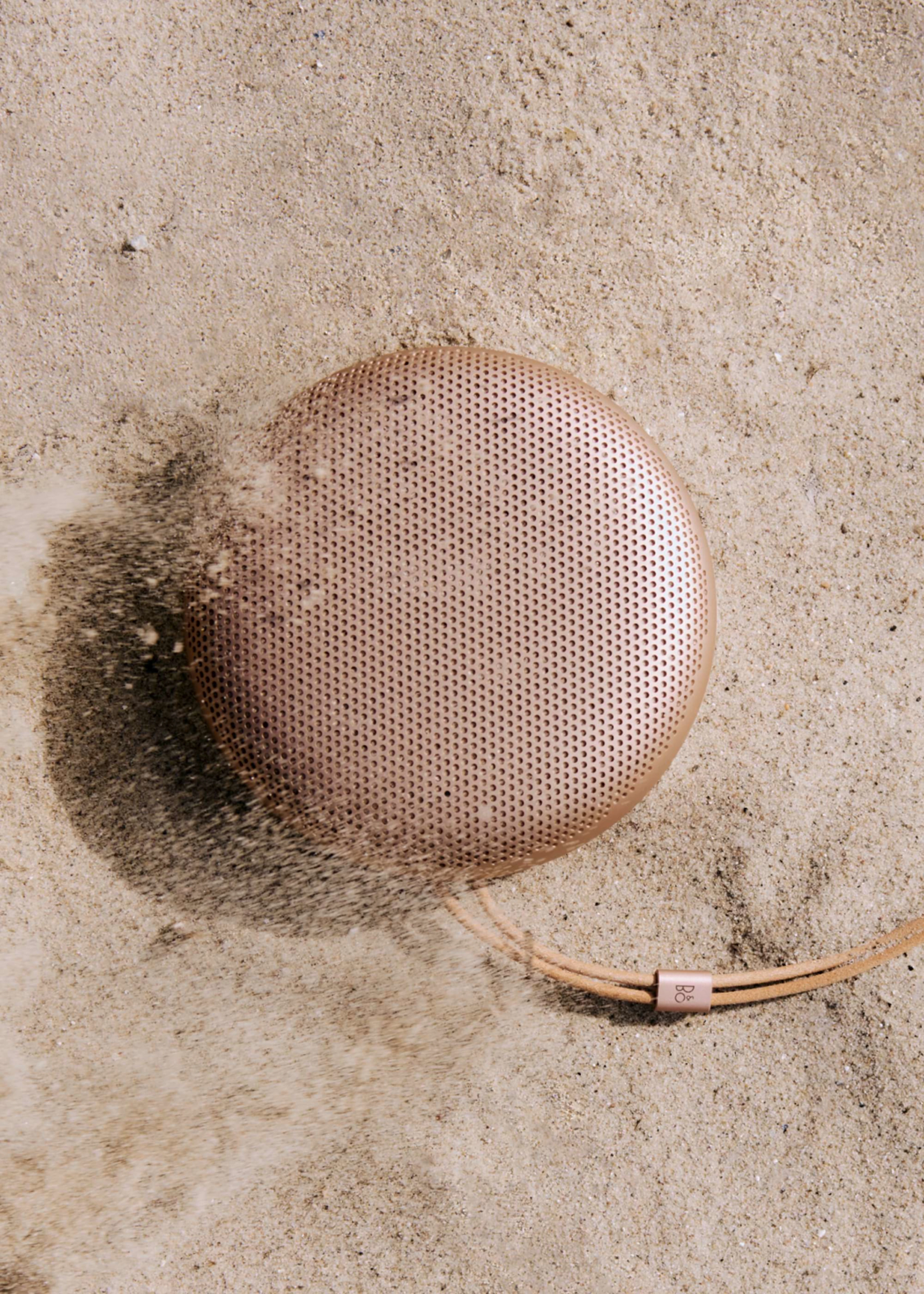 Beosound A1 3rd Gen laying in sand
