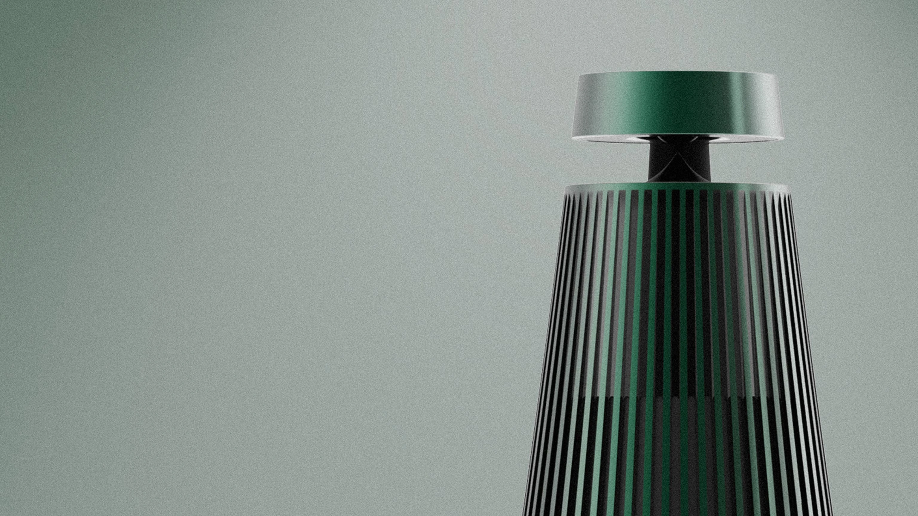 Beosound 2 in Racing Green showing the top detail