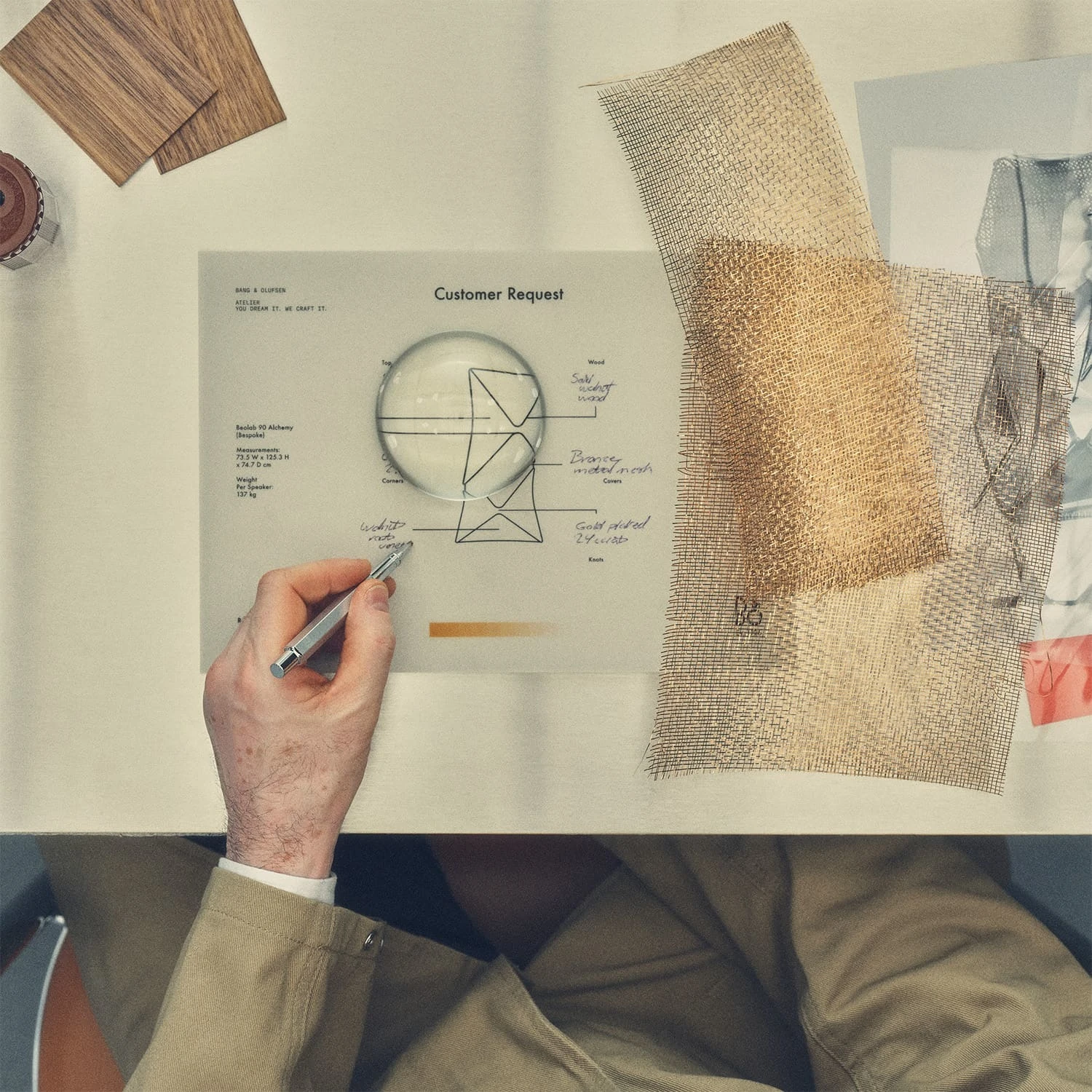 Design sketches of Bang & Olufsen Bespoke pieces on table