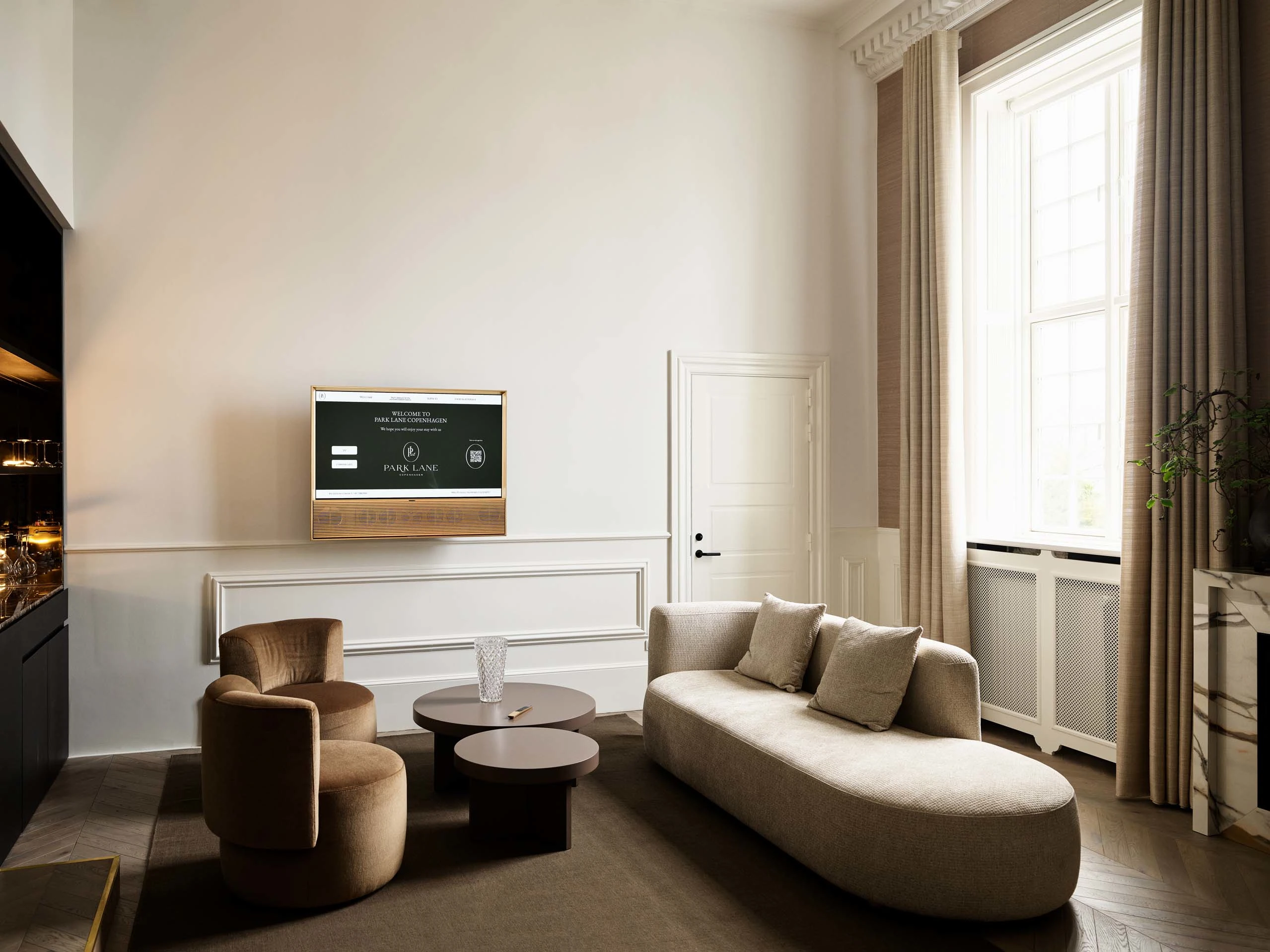 Bang & Olufsen television hanging on a wall in a Park Hotel room