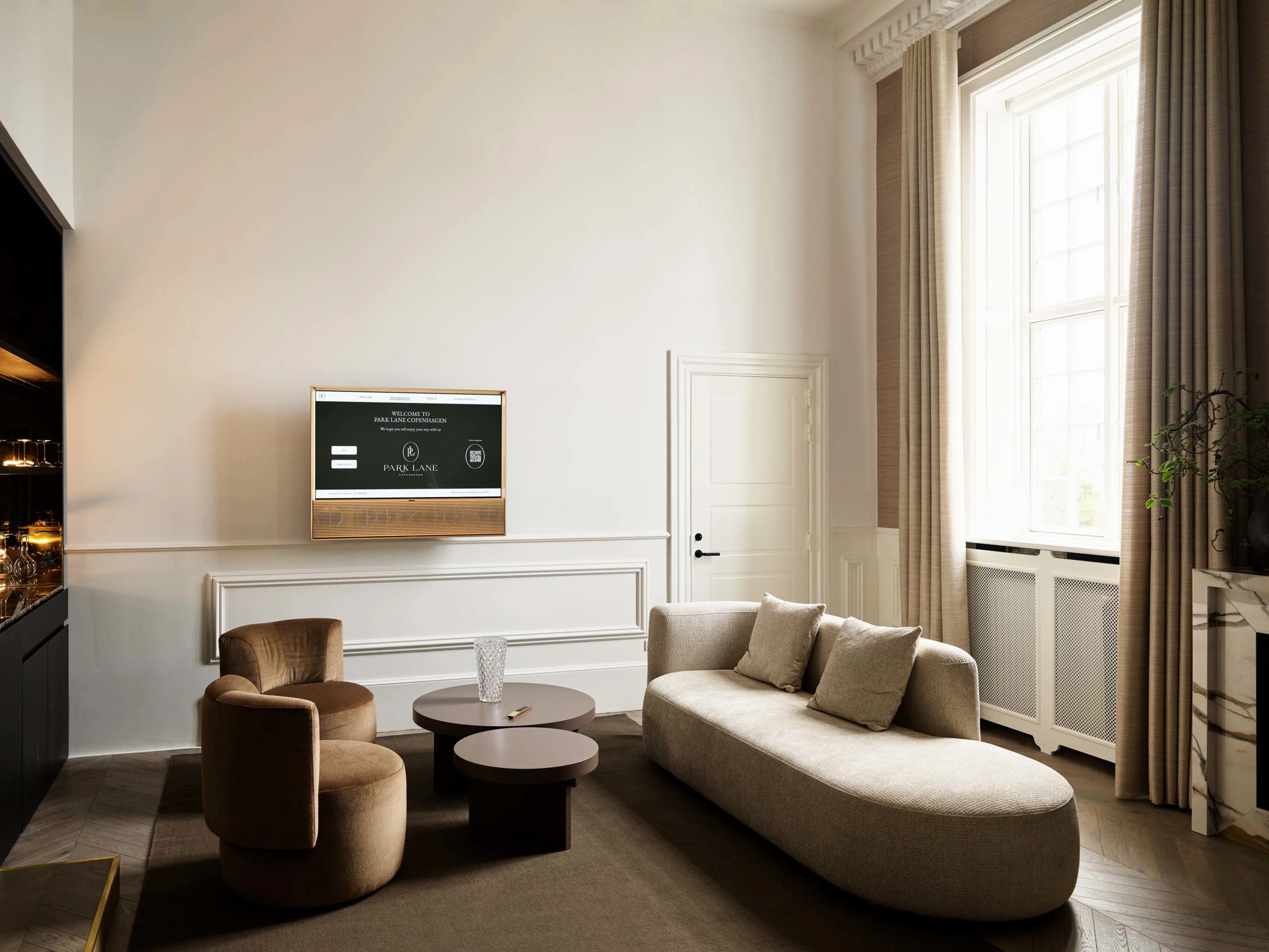 Bang & Olufsen television hanging on a wall in a Park Hotel room