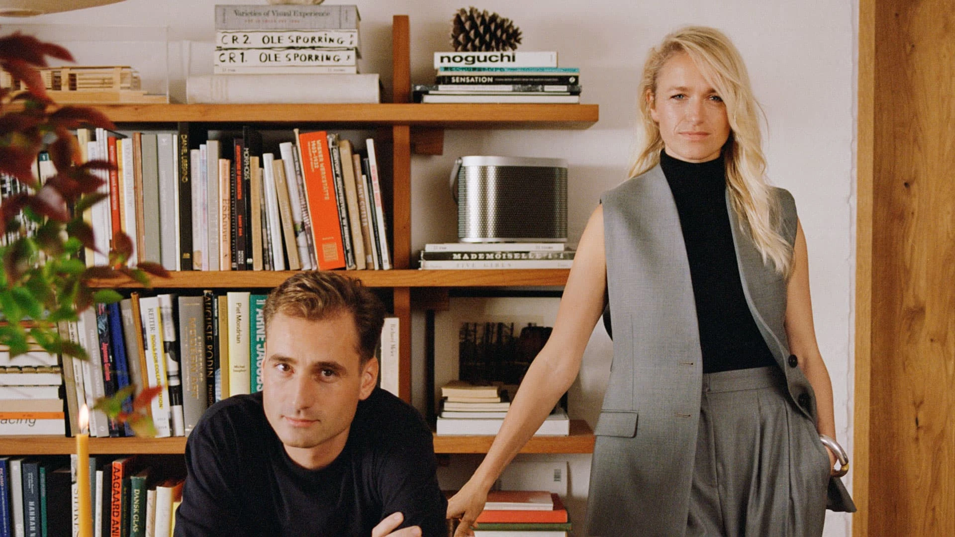 Image of danish architect Malene Hvidt and designer Nikolaj Lorentz in their living room with a Beosound A5 speaker in the background