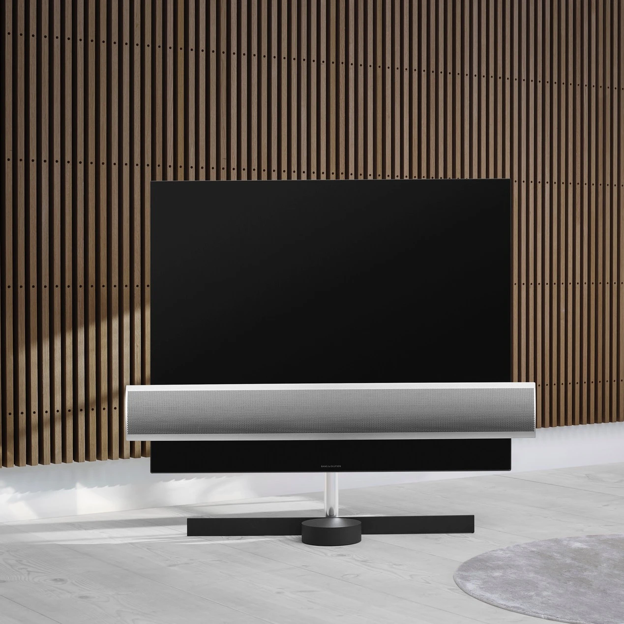 Front image of the television with wooden background