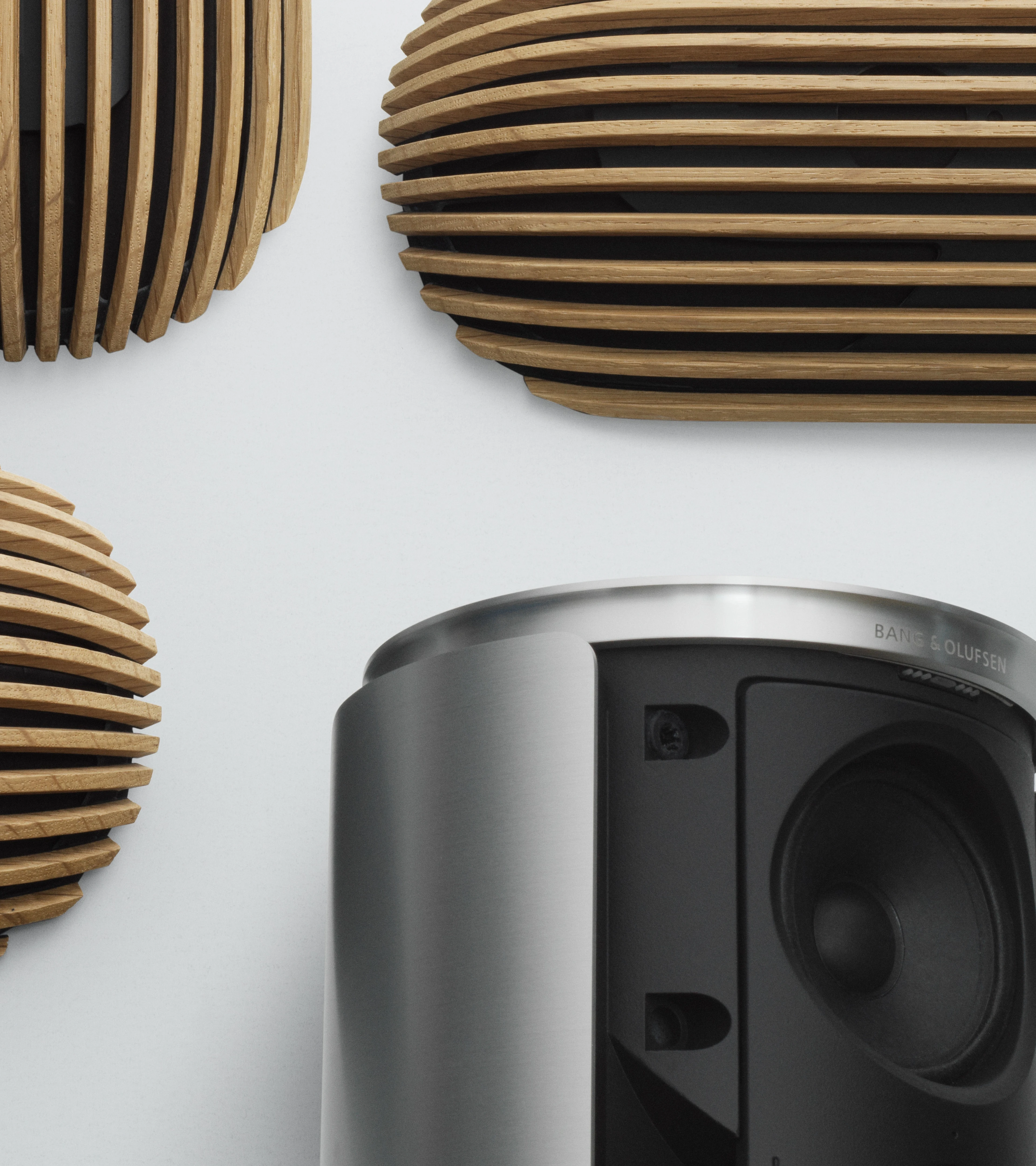Detail image of Beolab 8 speaker front with Oak cover and Bang & Olufsen logo