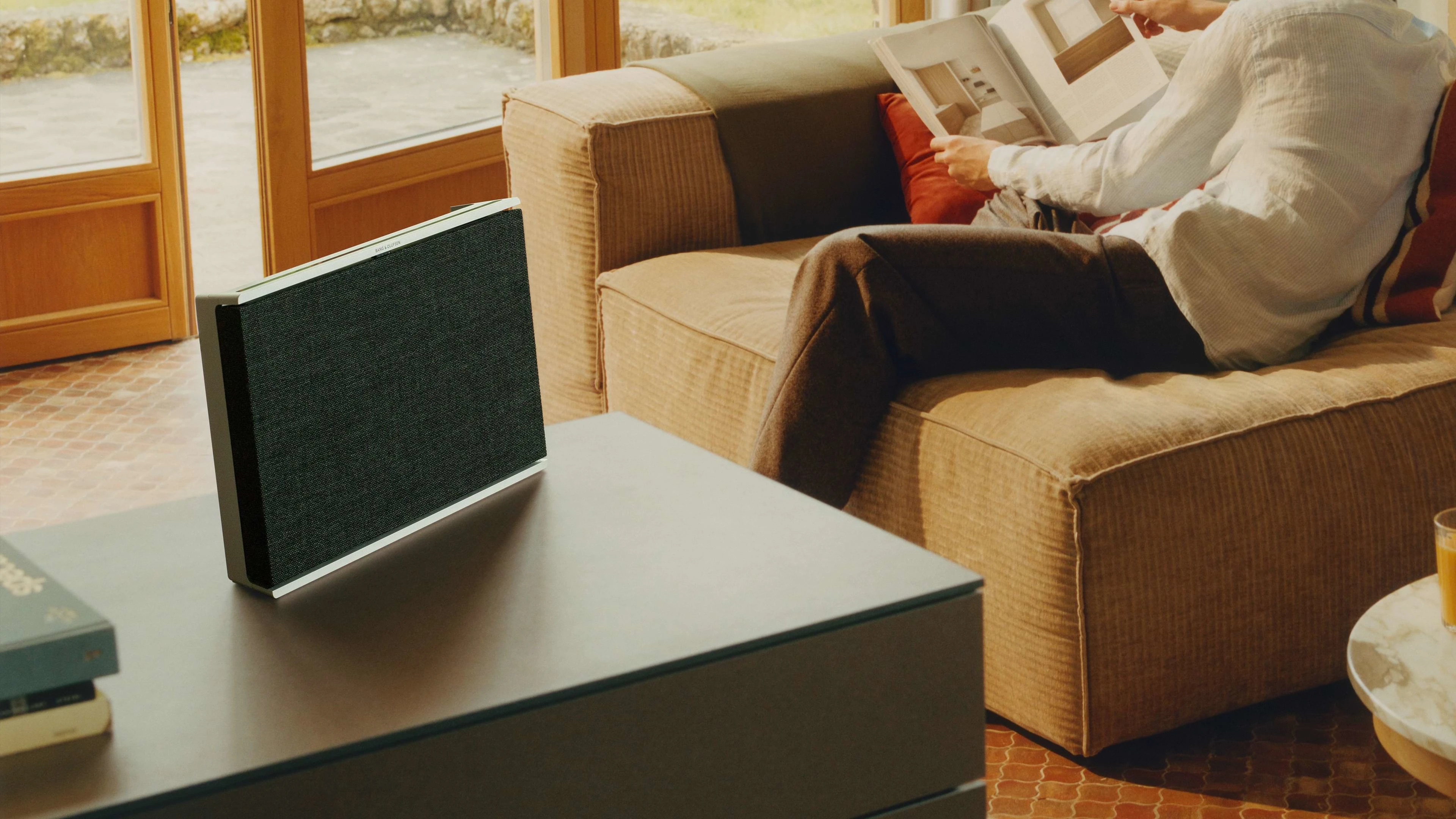 Beosound Level standing on a desk with fabric cover