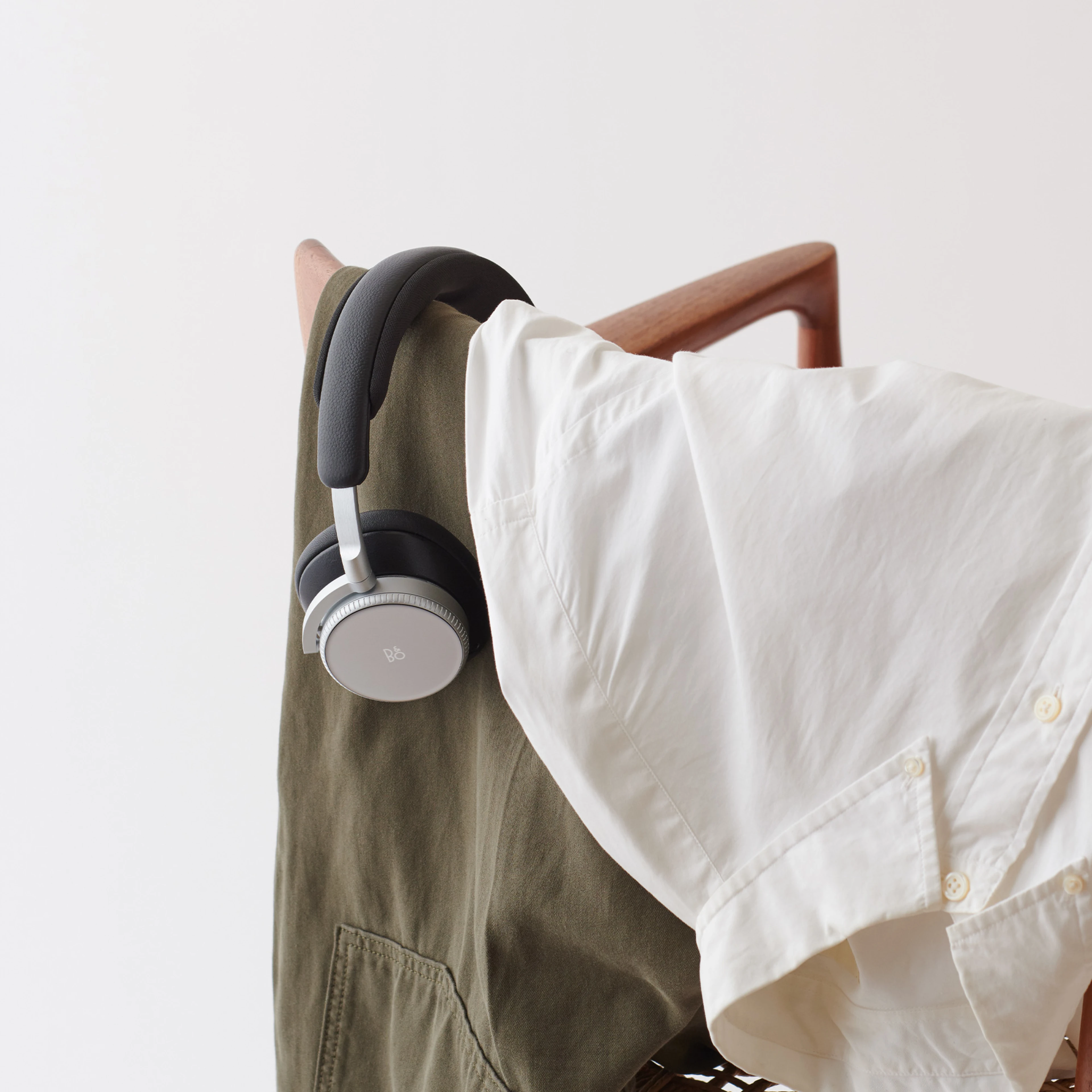 Beoplay on the chair with clothes