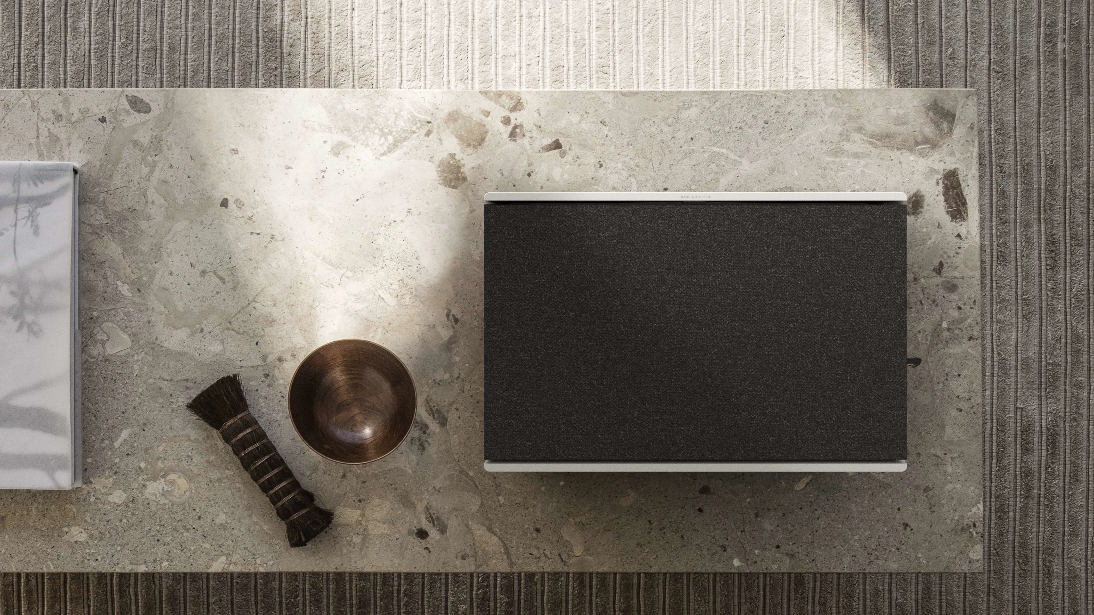 Beosound Level placed on a marble table