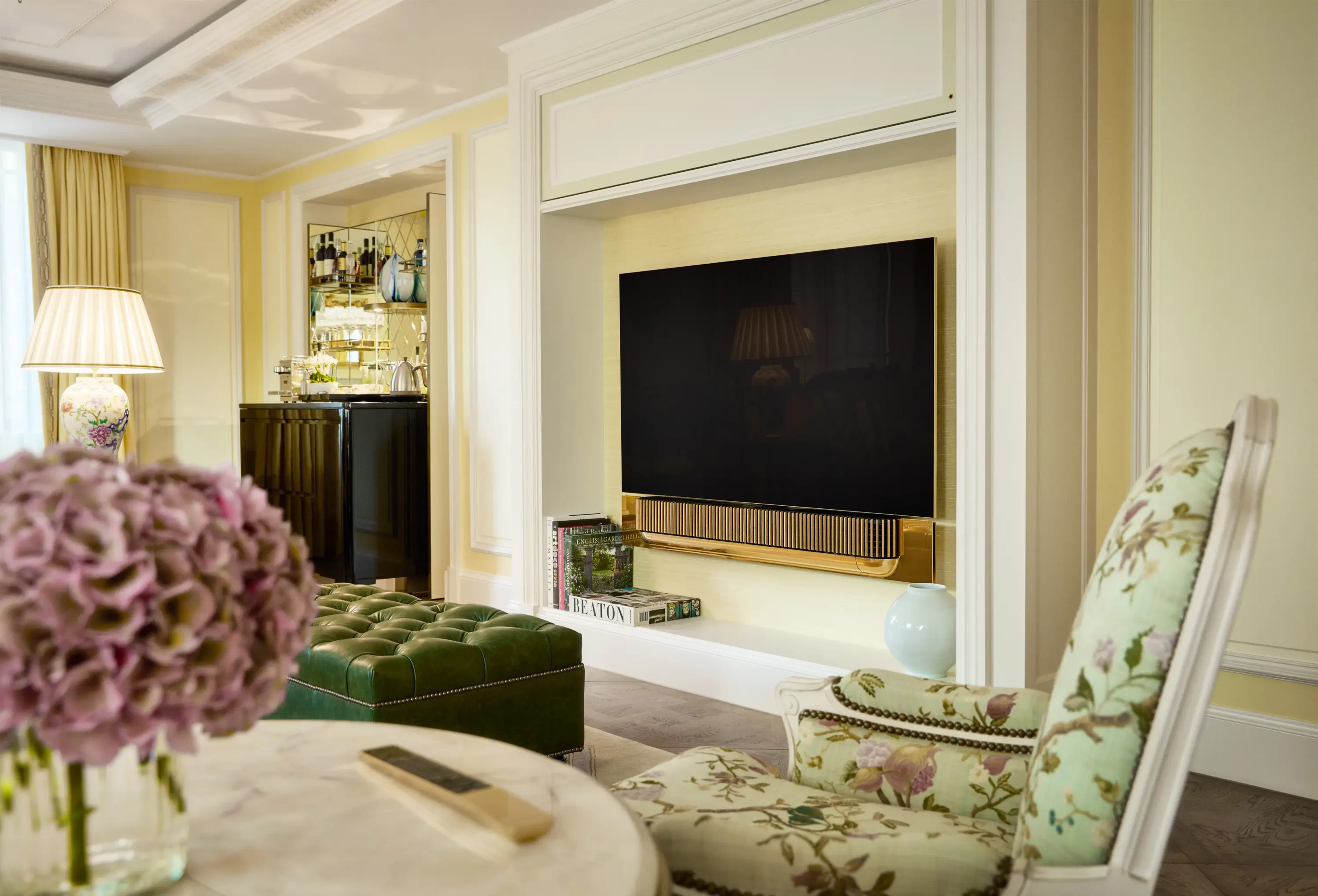 An image of a hotel room with Beosound Theatre integration.