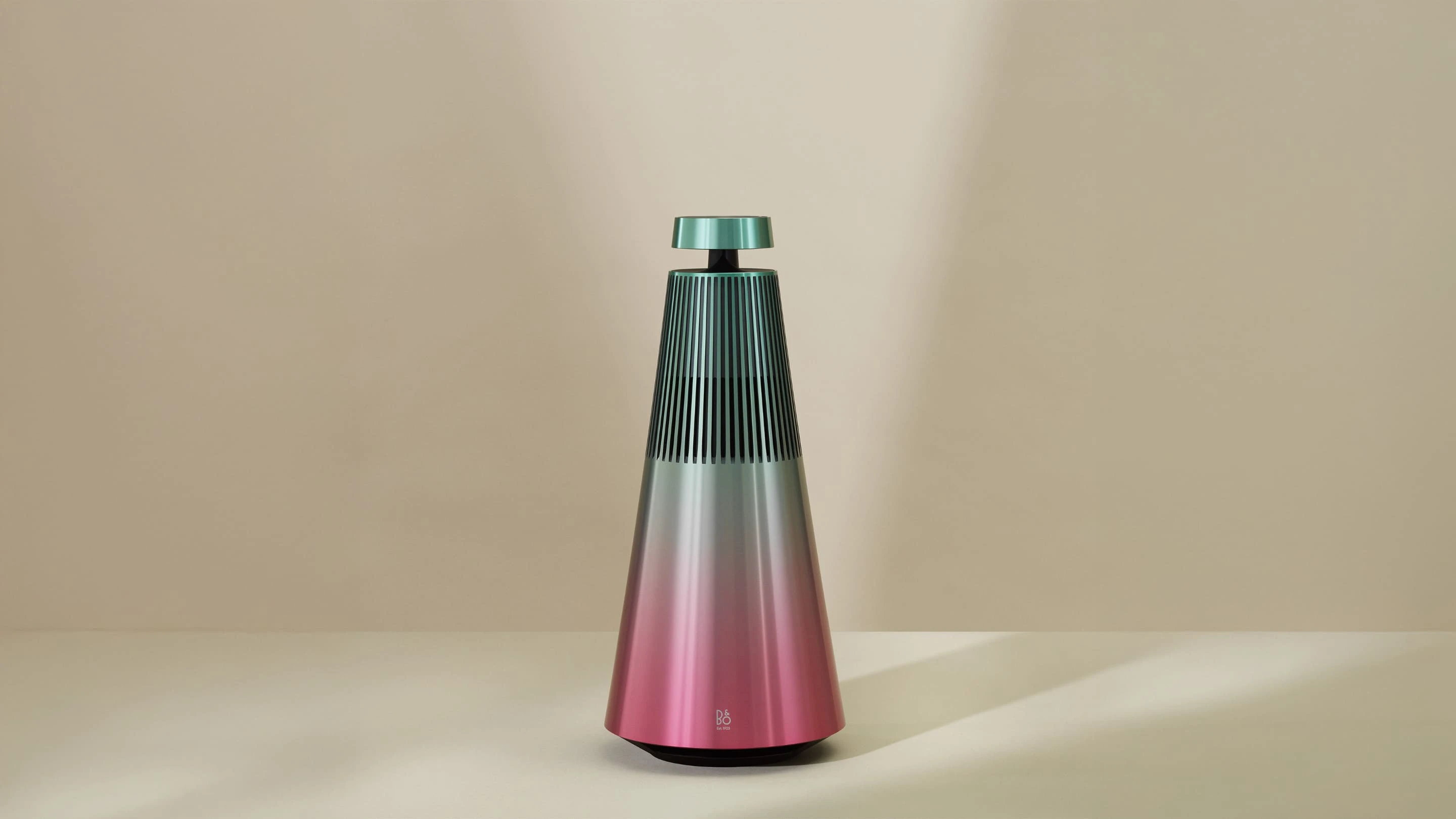Image of the limited edition Beosound 2 Gradient Collection, variant Jam in Pink and Green hues