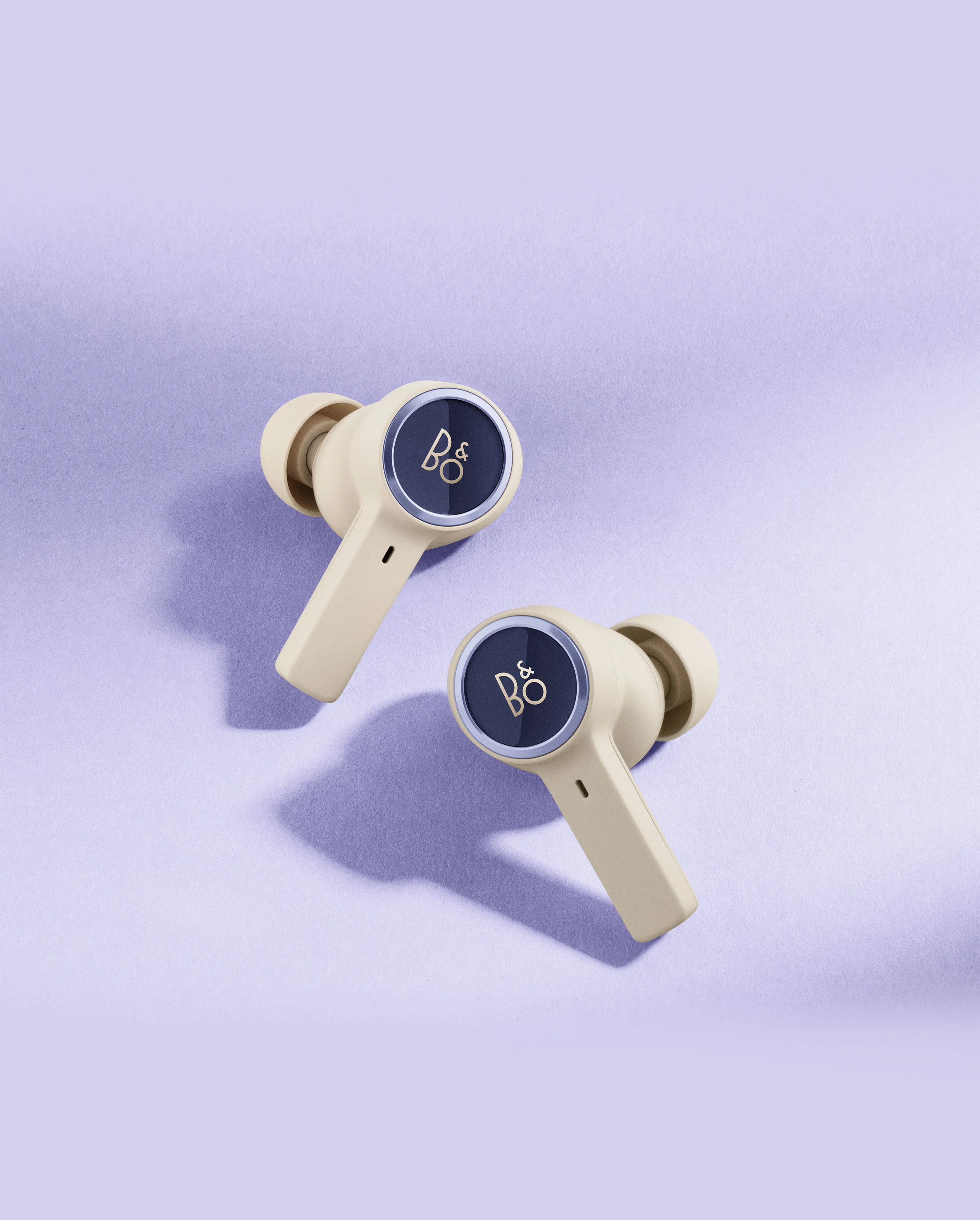 Beoplay EX Dawn Purple earphones with purple background