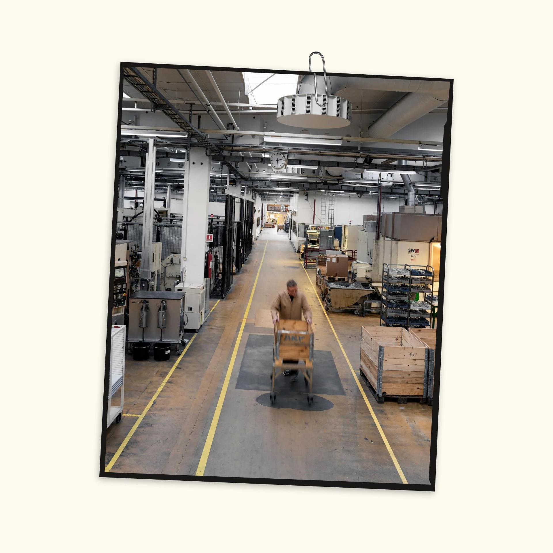 B&O employee pushing a cart in warehouse