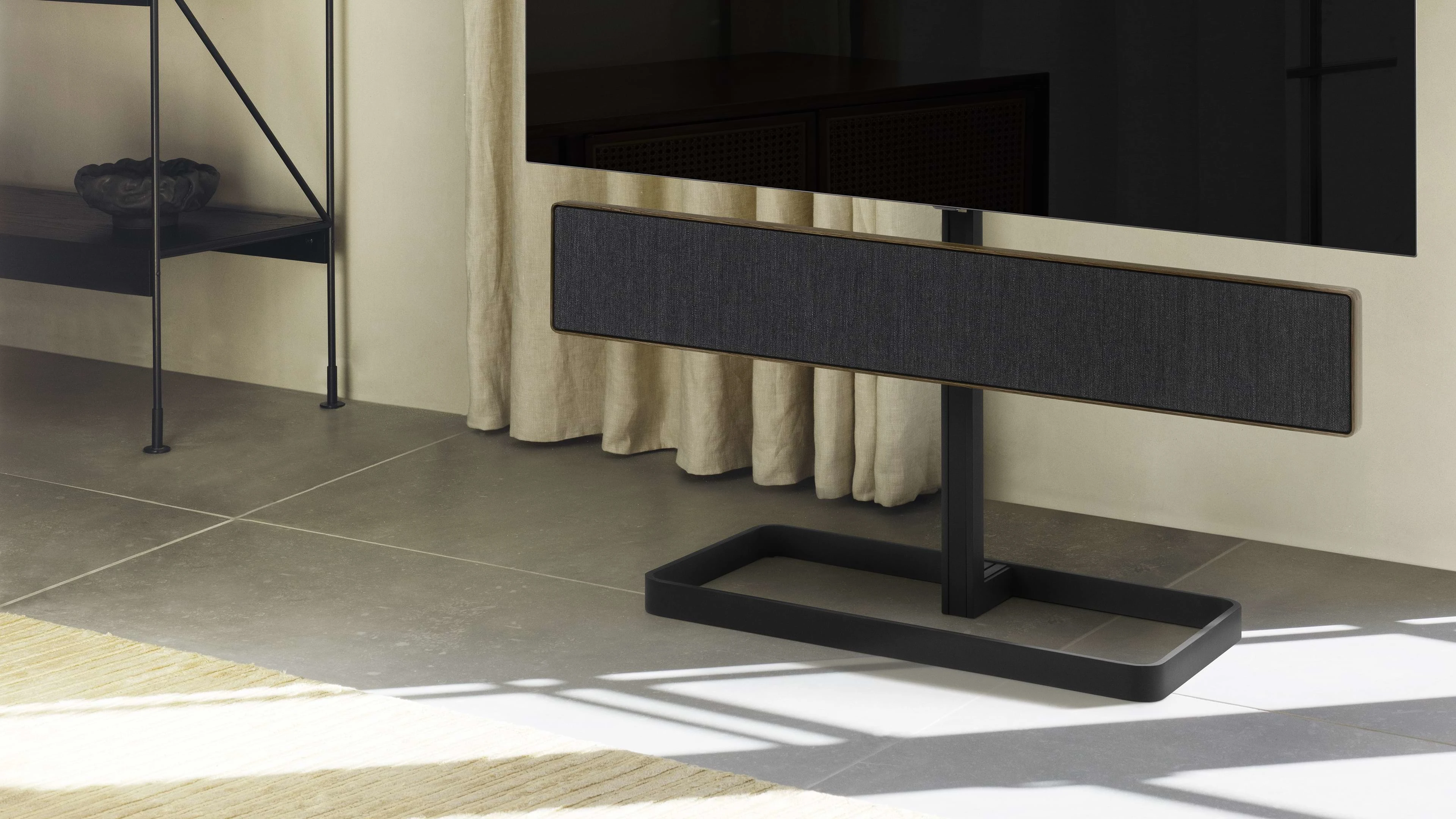 Beosound stage on a tv stand in living room