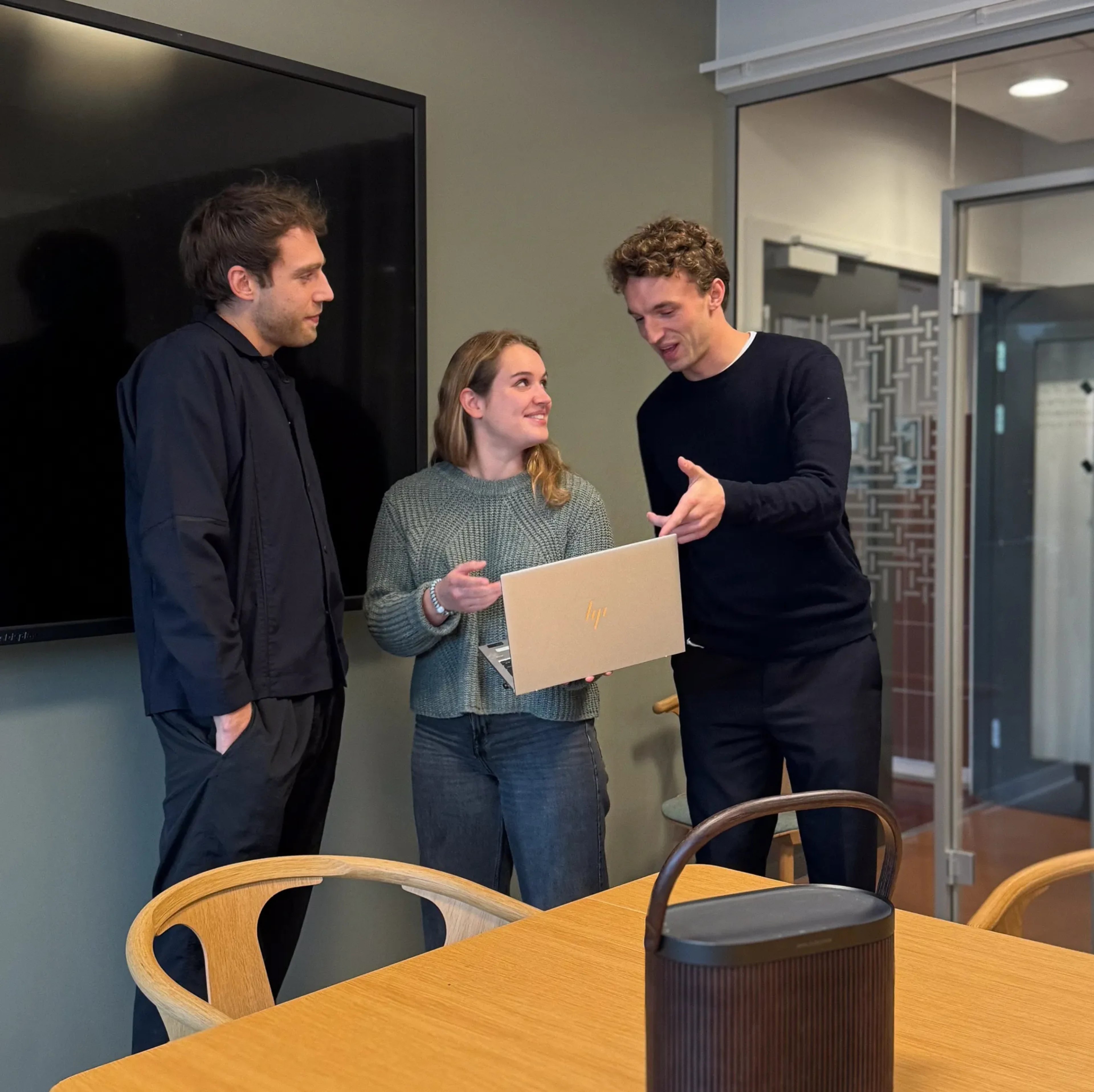 B&O employees standing around table