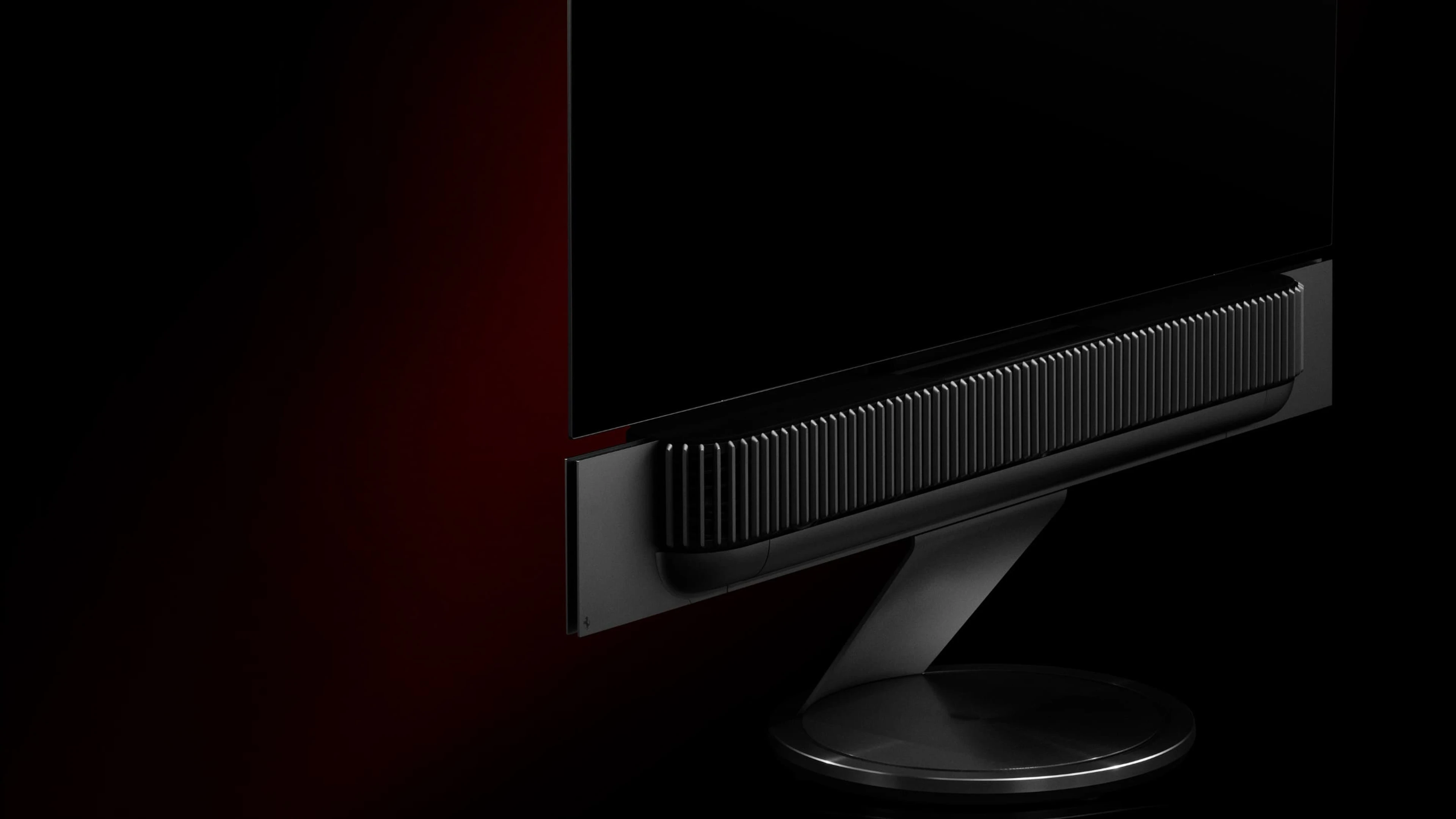 Beovision Theatre Ferrari edition TV on a dark background