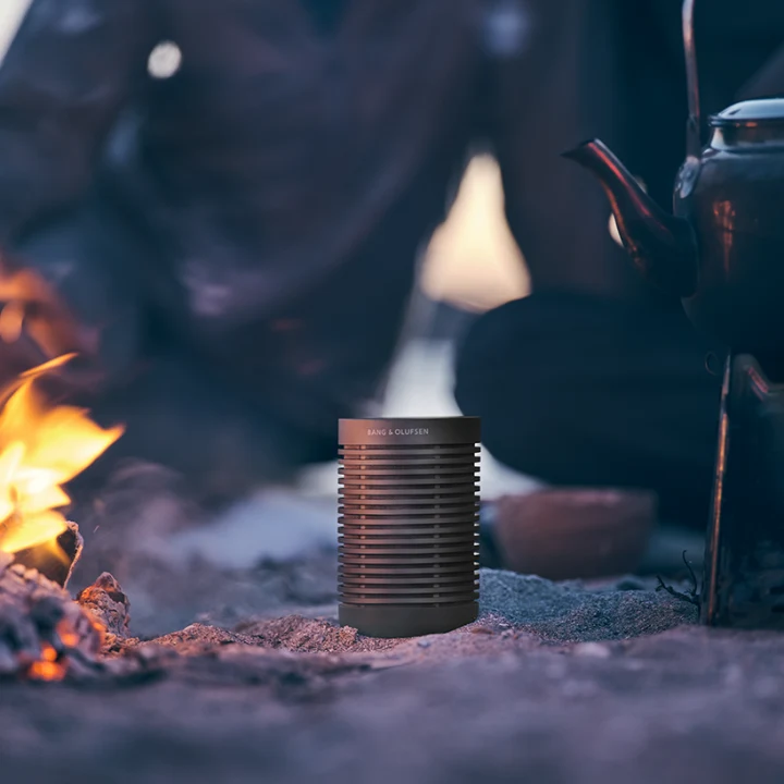 Beosound Explore speaker playing music while hiking outdoors