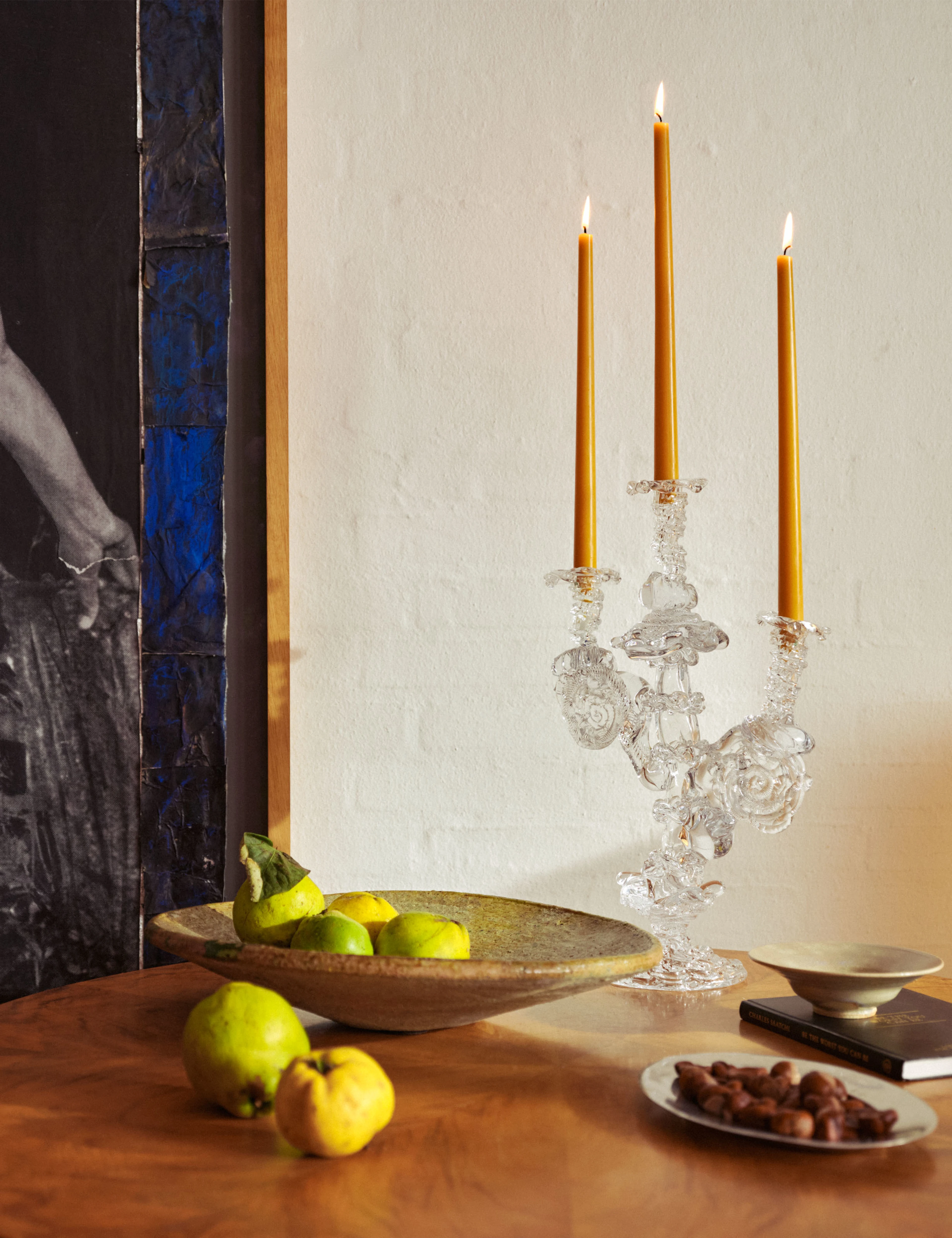 Image of fruit and candles on a table