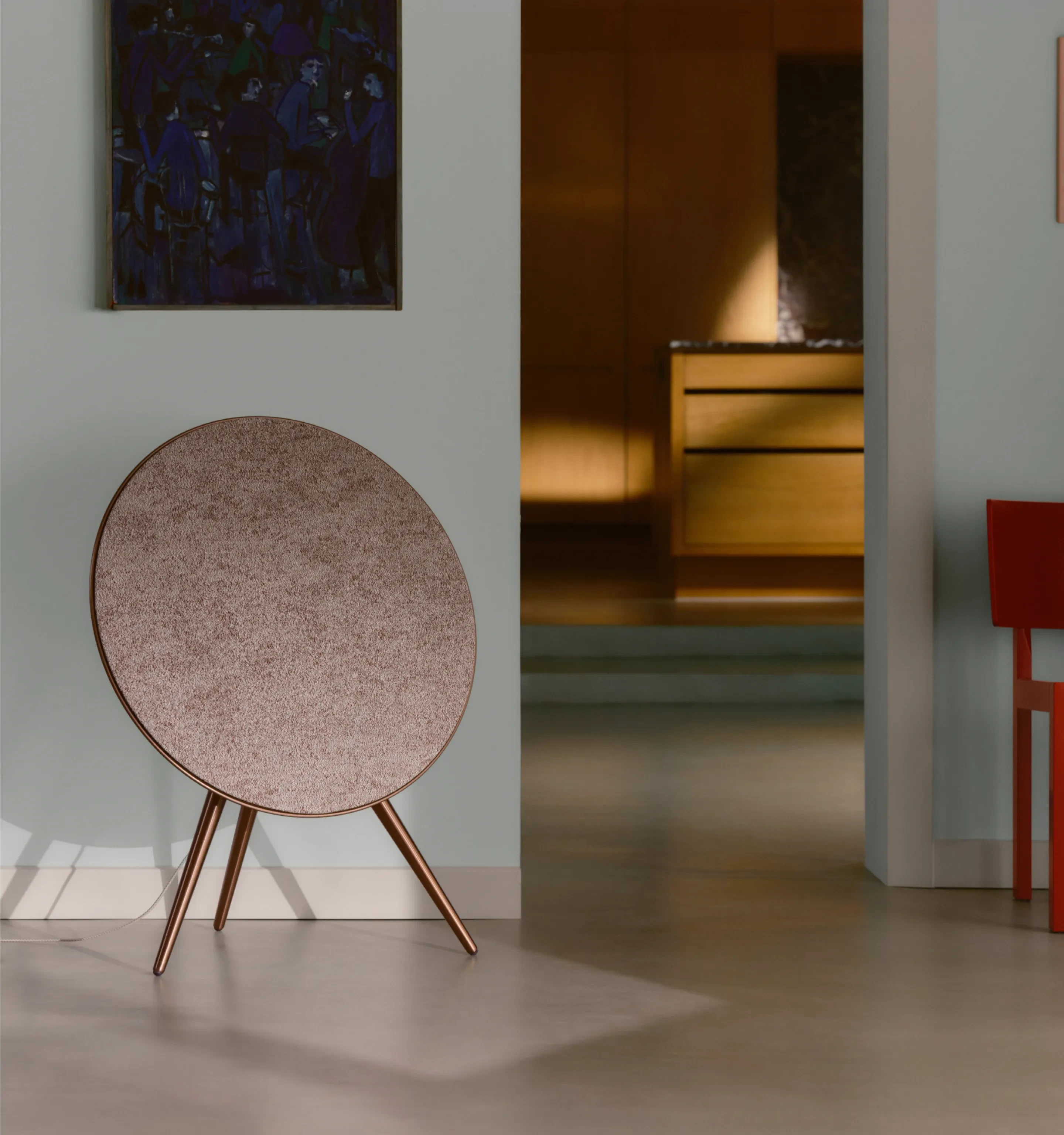 Beosound A9 in color variant Sienna Brown in a room.
