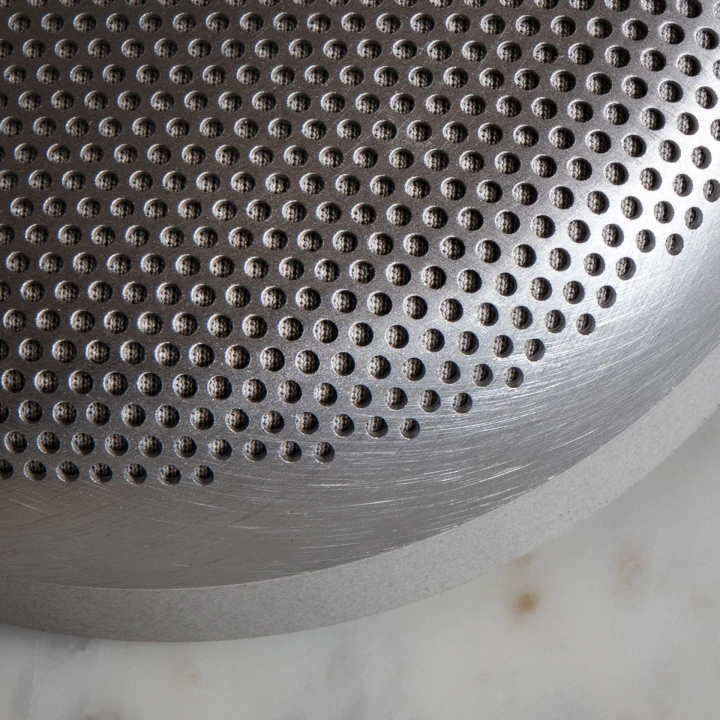 Beoplay A1 speaker close up of the aluminium grill by Norm Architects