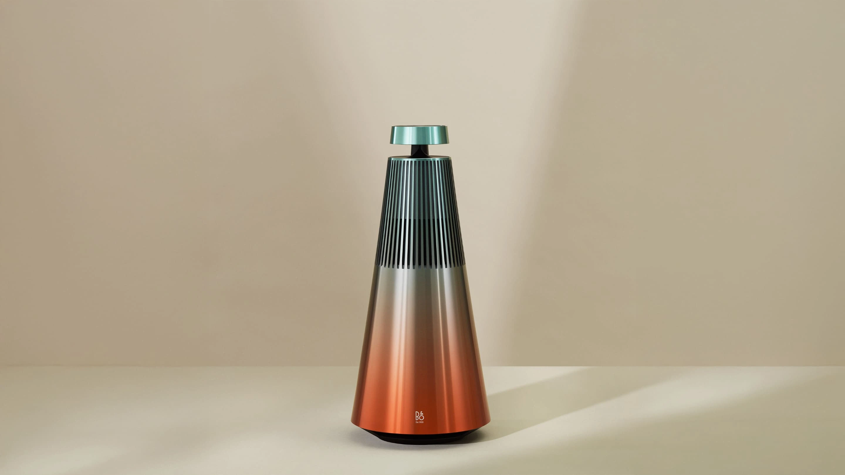 Image of the limited edition Beosound 2 Gradient Collection, variant Riff in Orange and Green hues