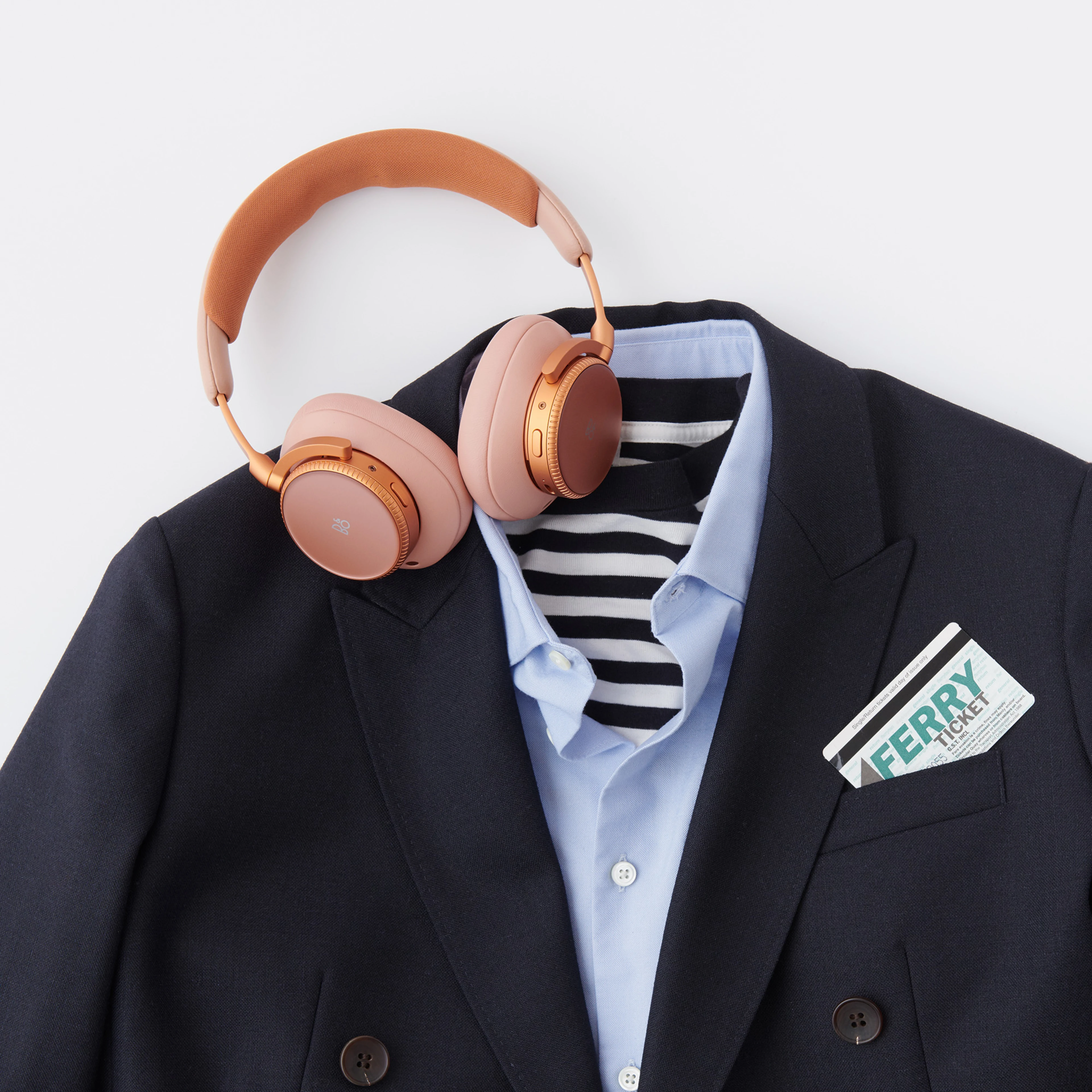 Beoplay H100 with shirt and suit