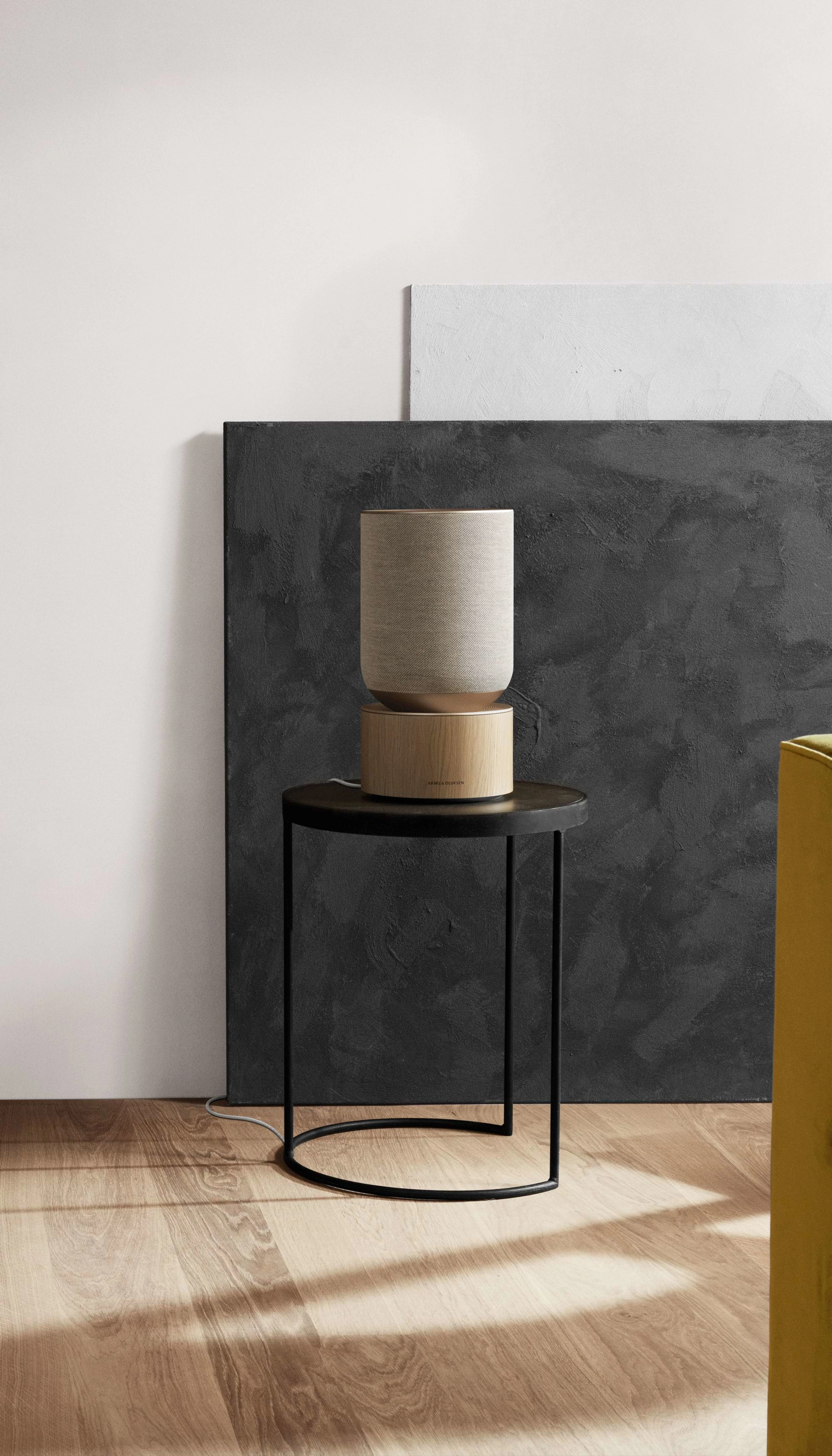 Beosound Balance displayed on a table in a living room