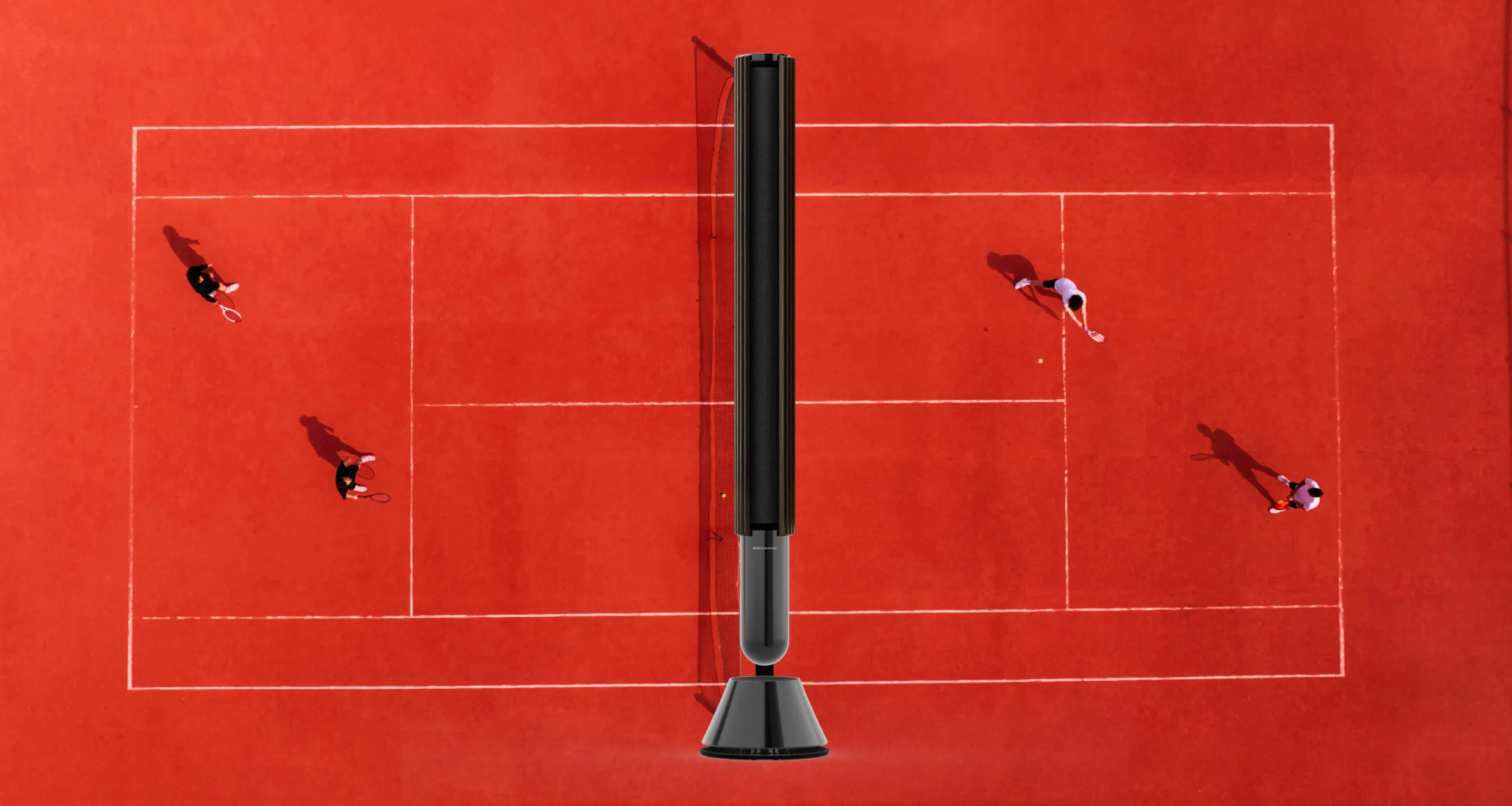 Beolab 28 on a tennis courte with tennis players