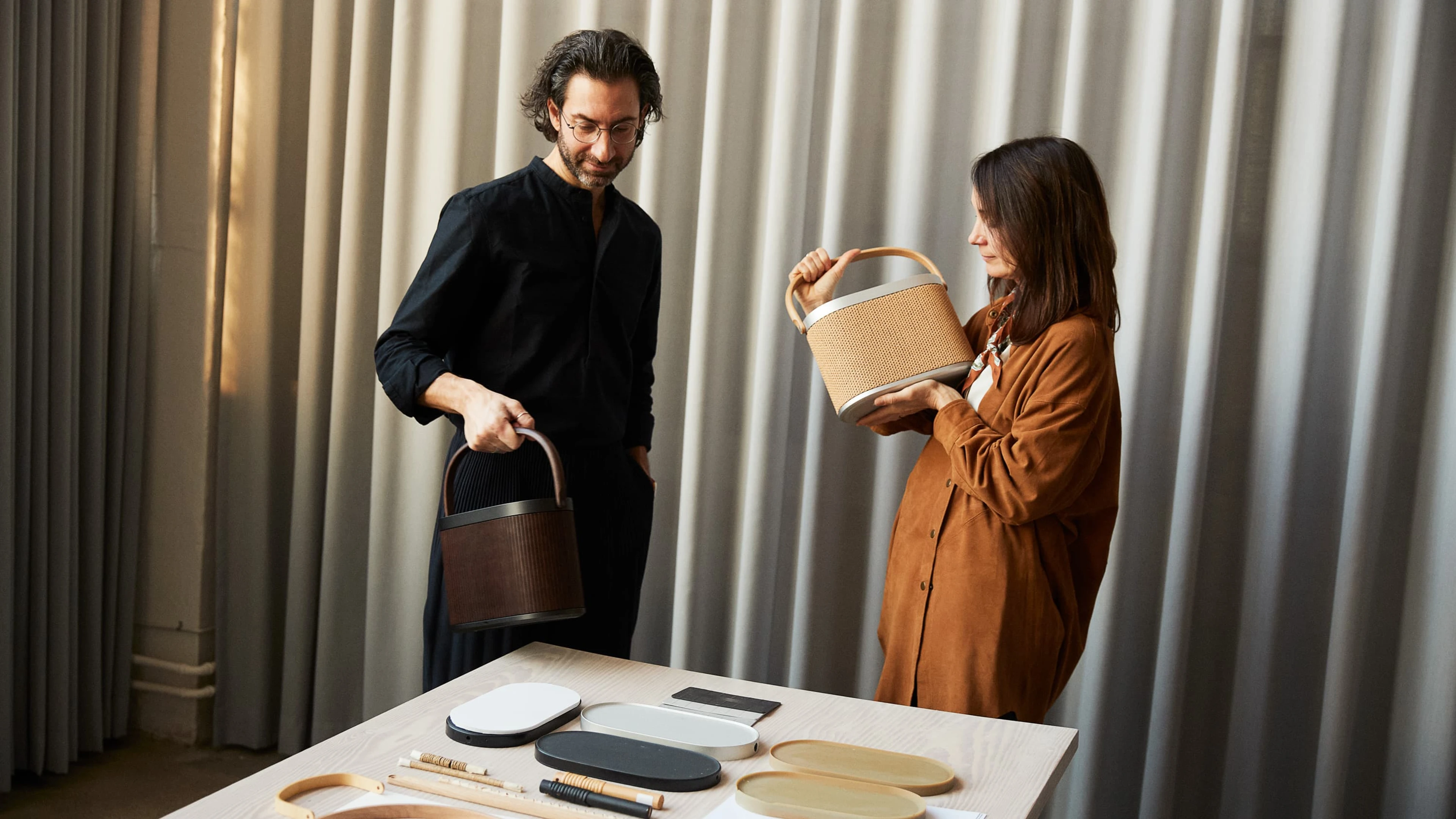 Image of GamFratesi duo holding Beosound A5