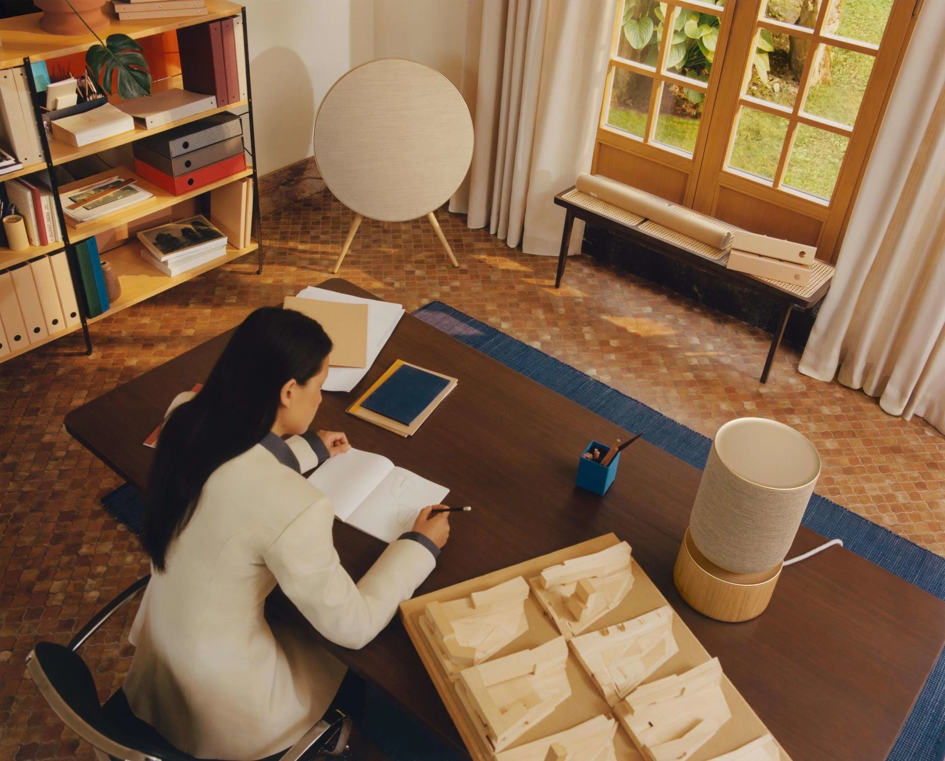 Beosound A9 and Balance placed in a living room
