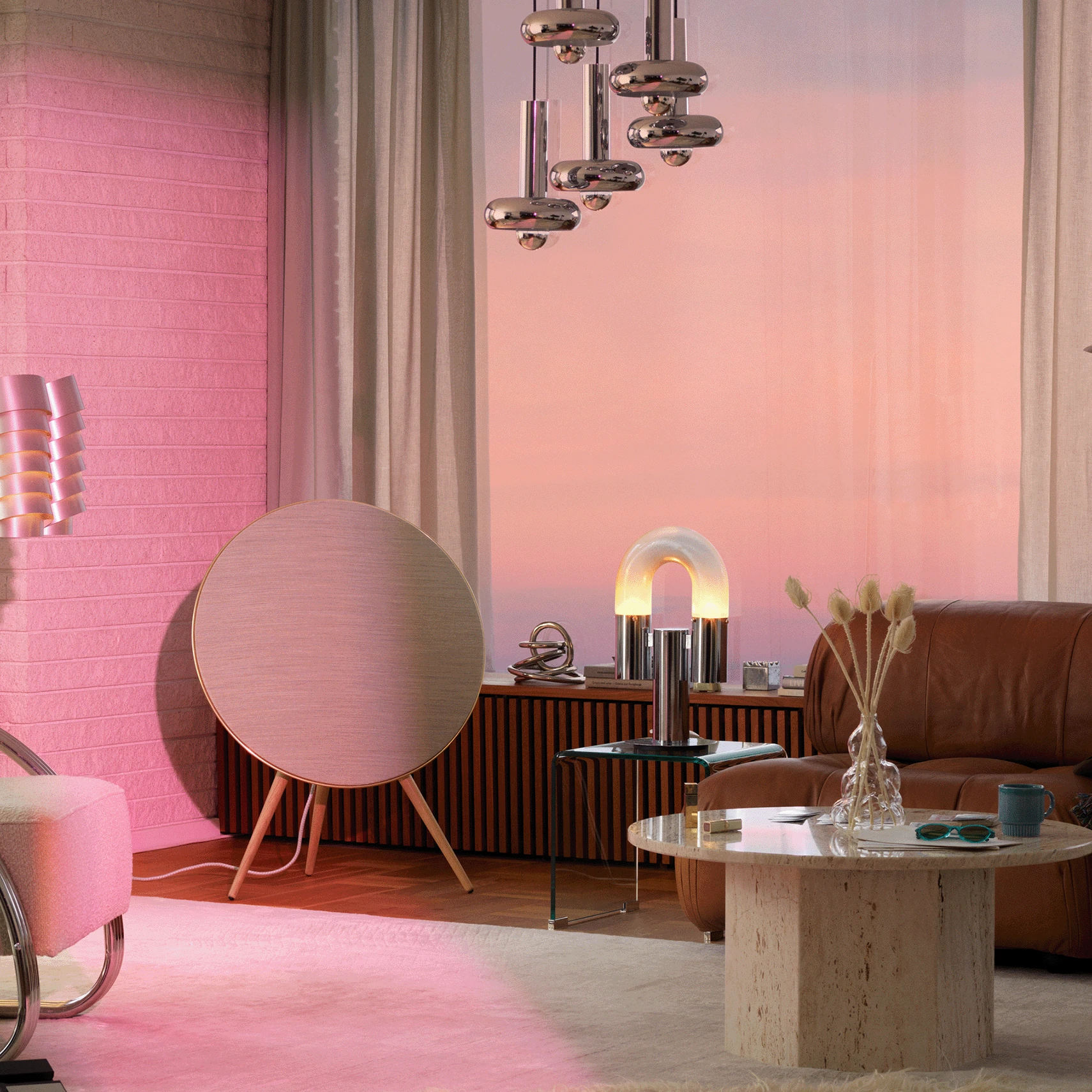 Living room with Beoplay A9 in a corner of the room and Beosound Balance on the other side