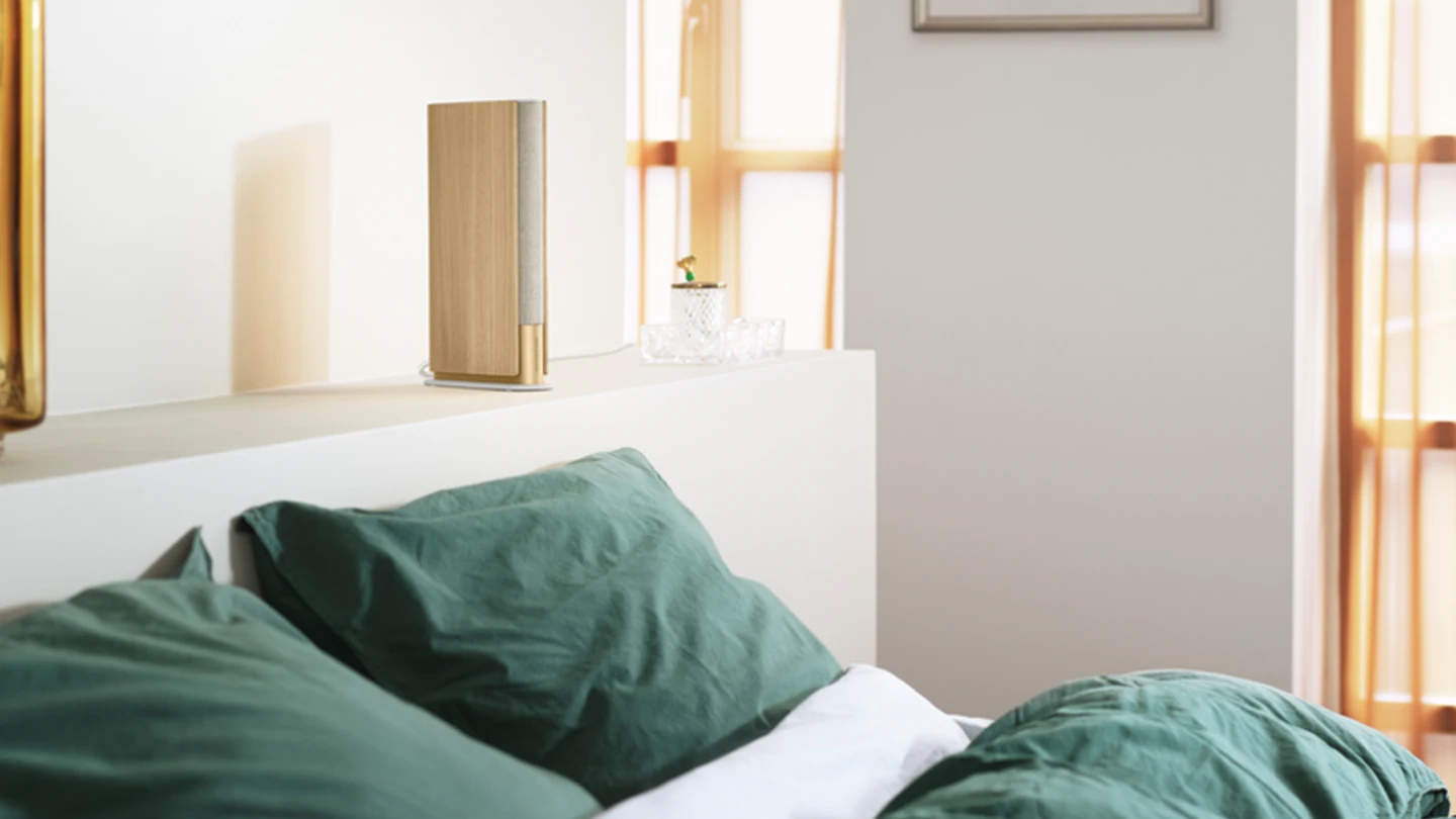 Beosound Emerge wi-fi speaker placed in the bedroom