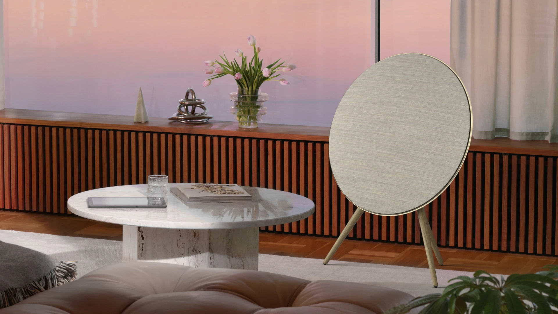 Beosound A9 in Gold Tone in a living room setting