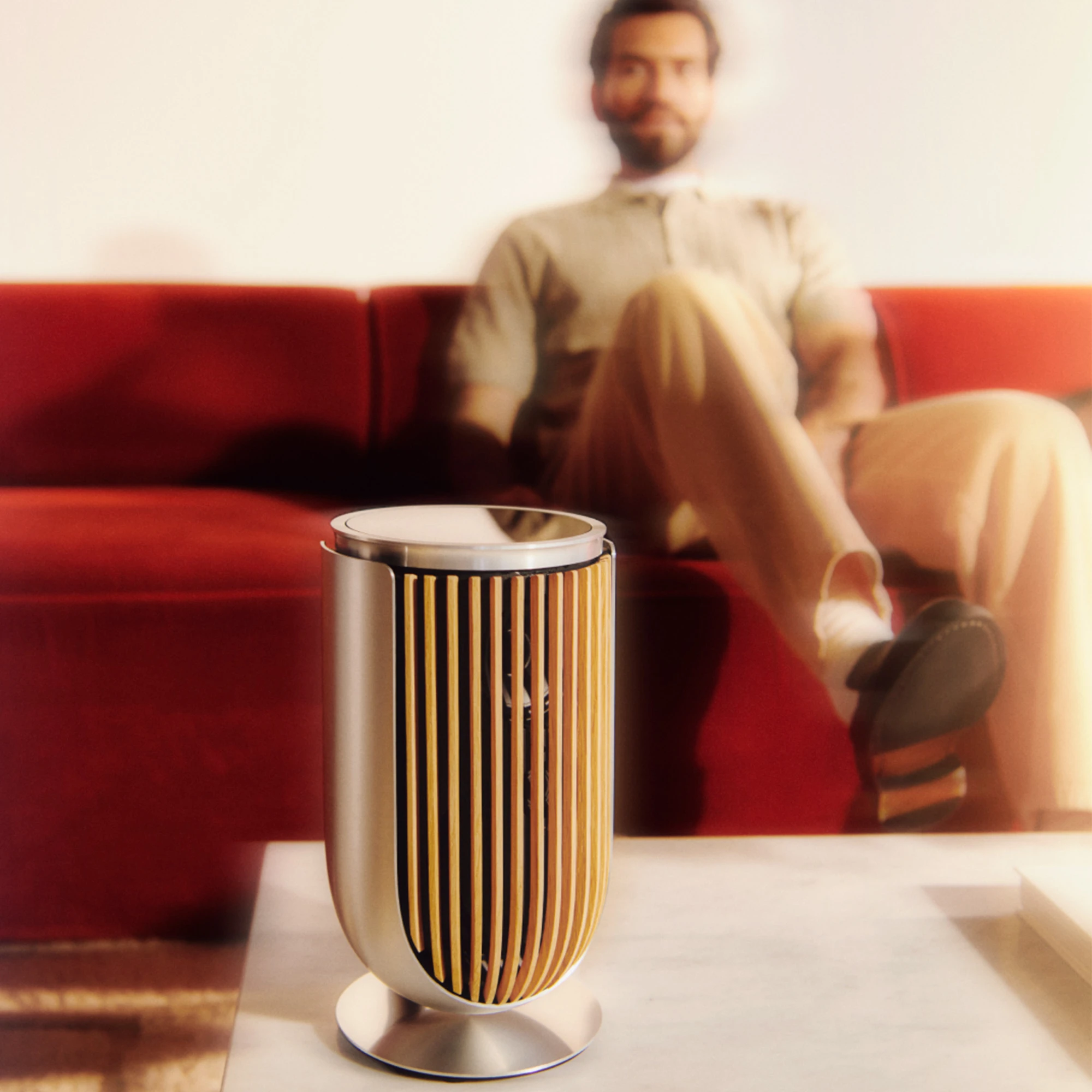 man looking at beolab 8