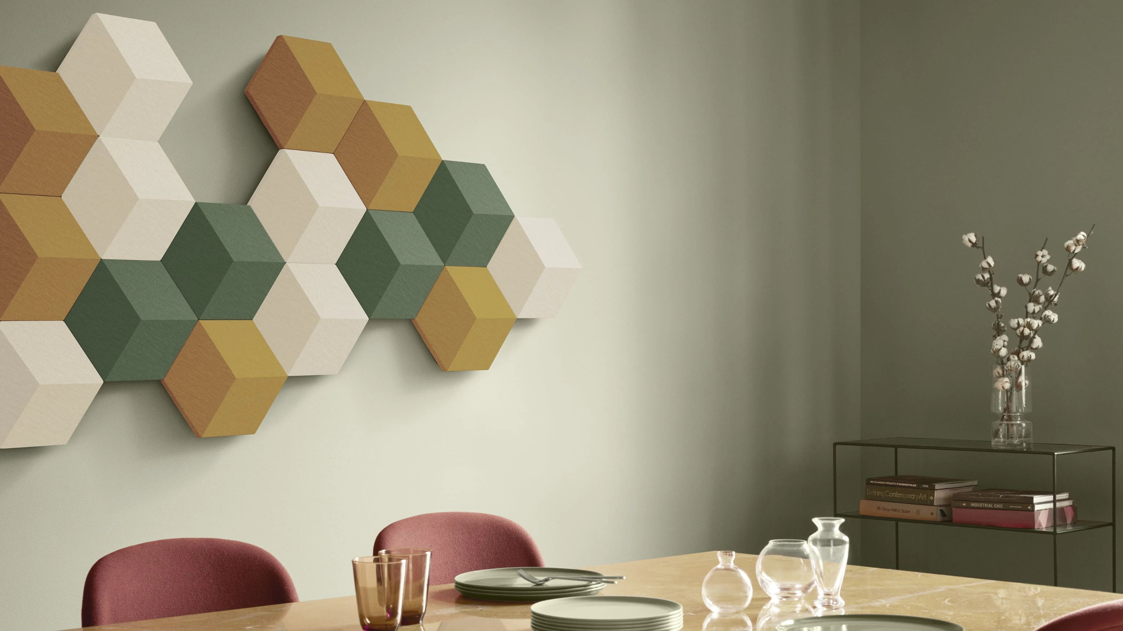 Beosound Shape in meadow green, harvest ochre, and almond beige colored fabrics in the dining area