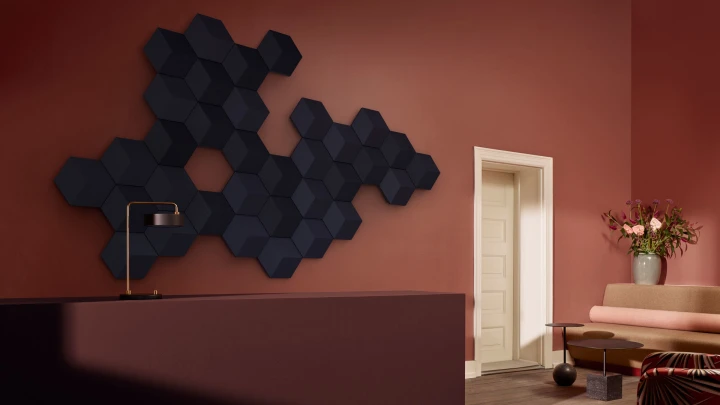Beosound Shaping speaker hanging on the wall