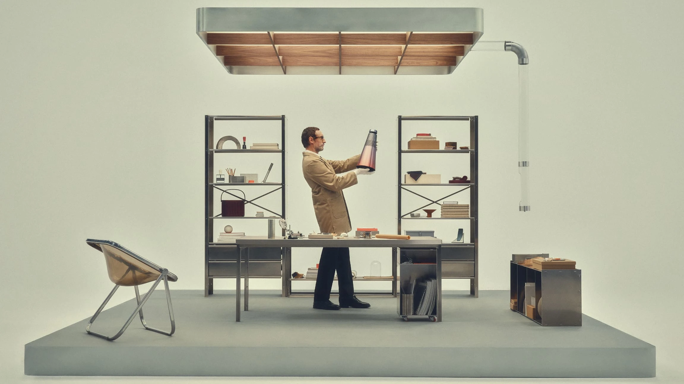 Person admiring the Beosound 2 Atelier