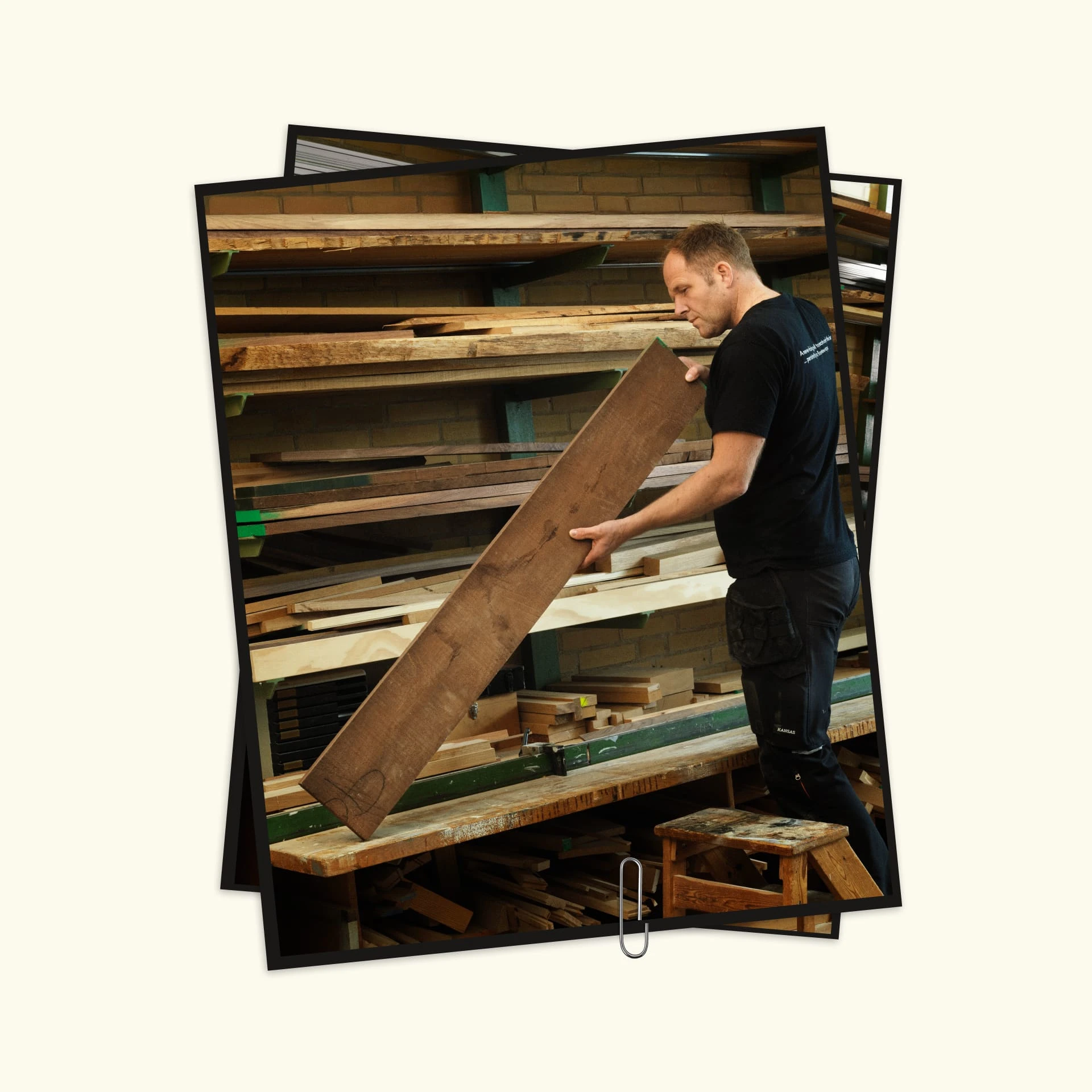 Person holding a piece of wood