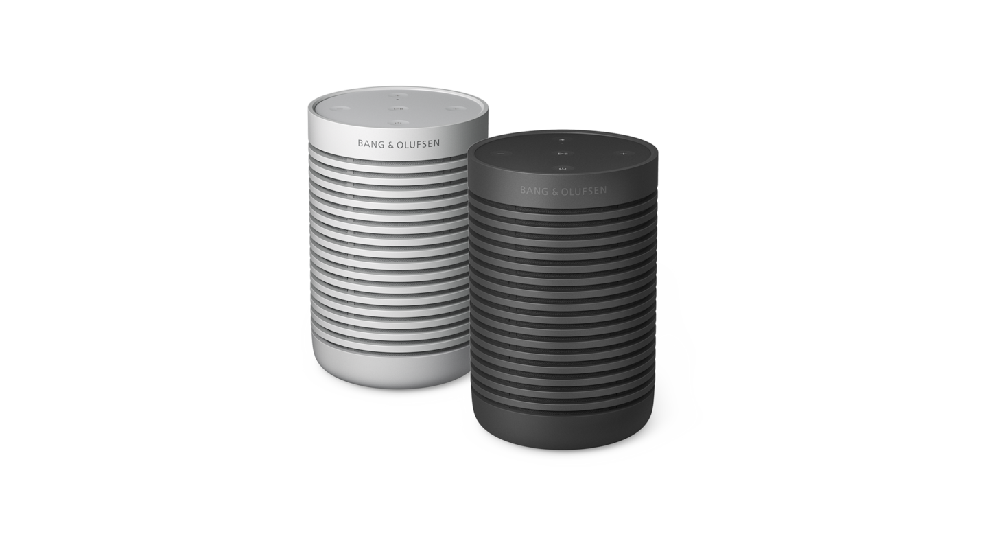 A pair of Beosound Explorer in grey mist and black anthracite