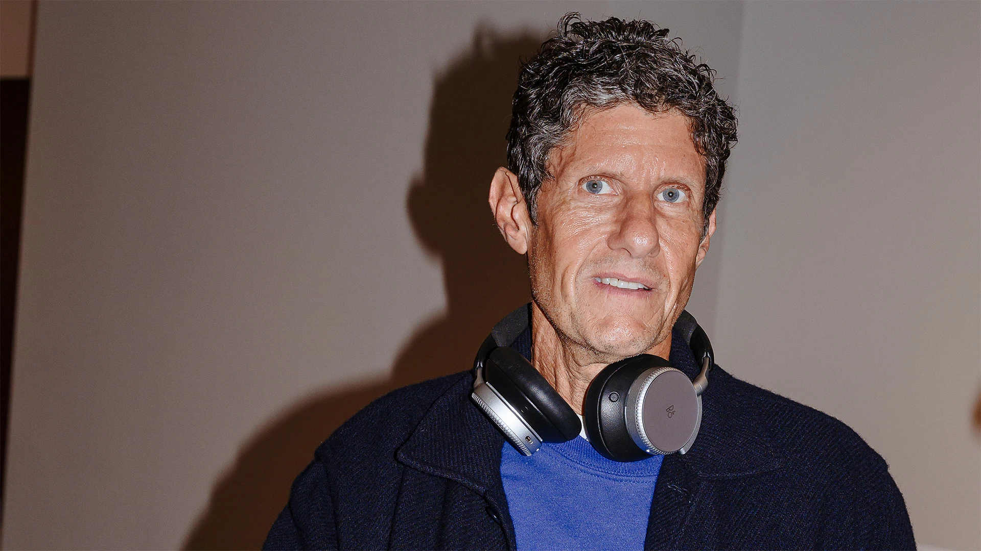Beastie Boys Founder Mike D with Beoplay H100 headphones