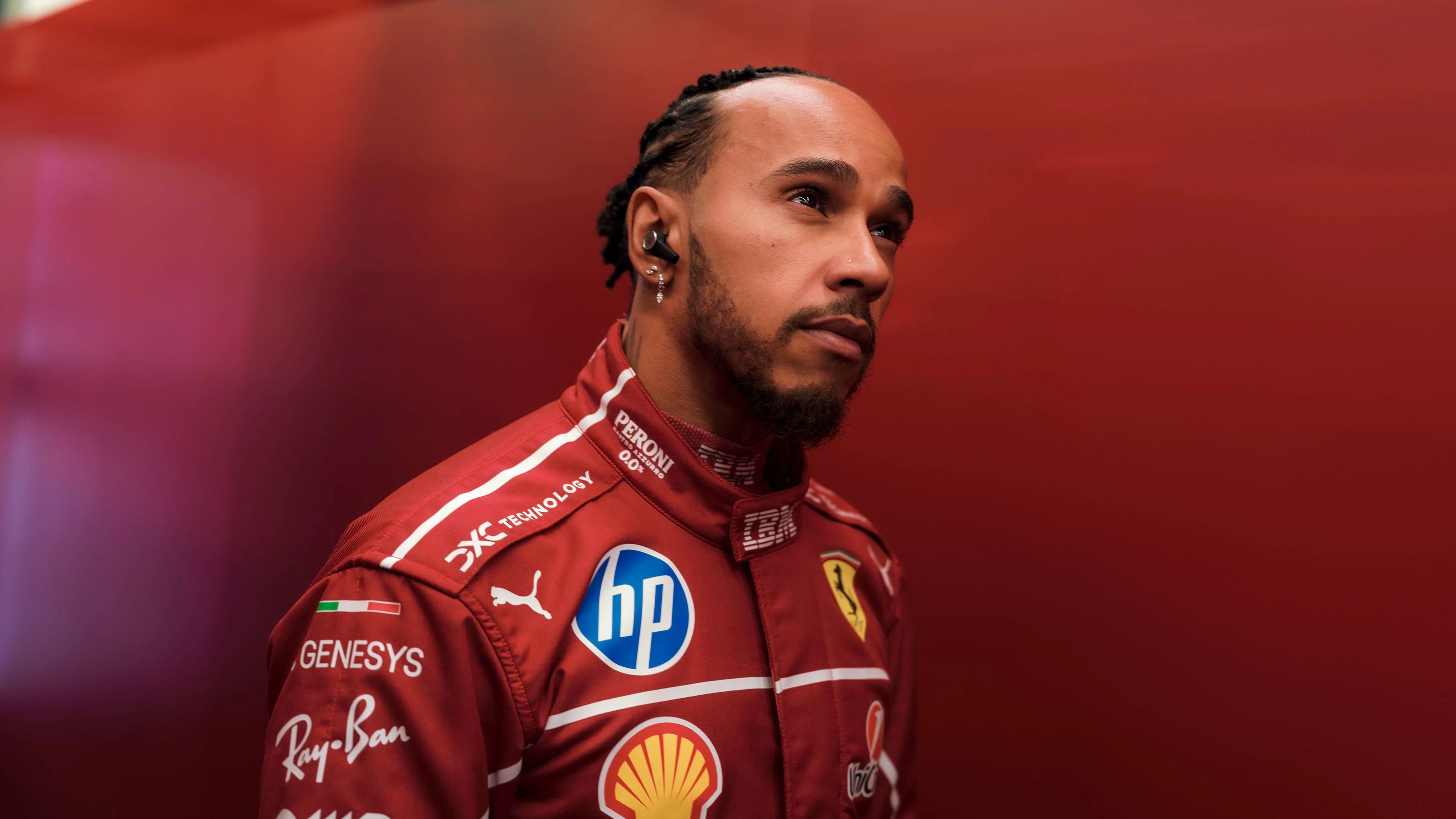 F1 driver wearing the Beoplay Eleven